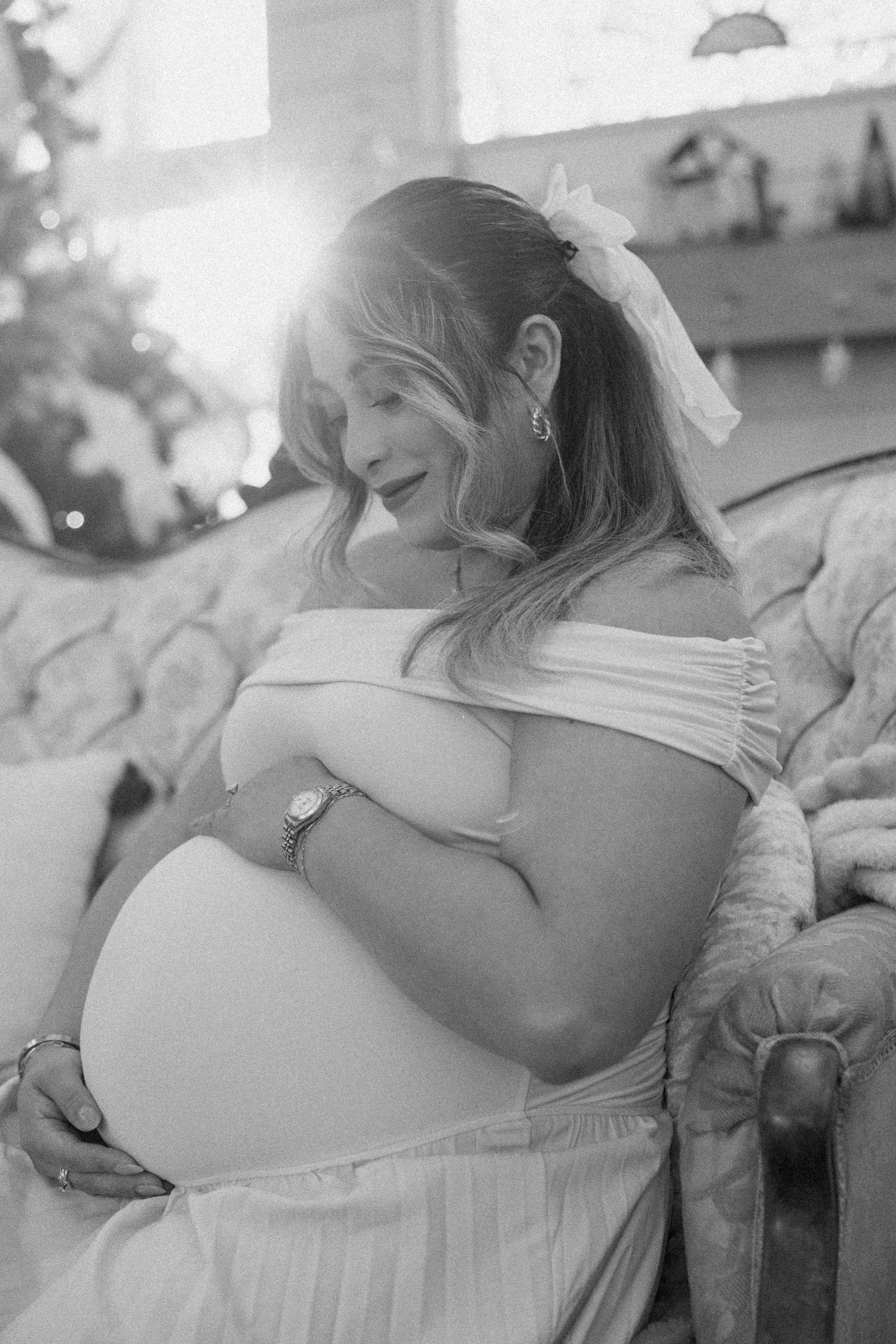Black and white intimate maternity photos showing tender moments.