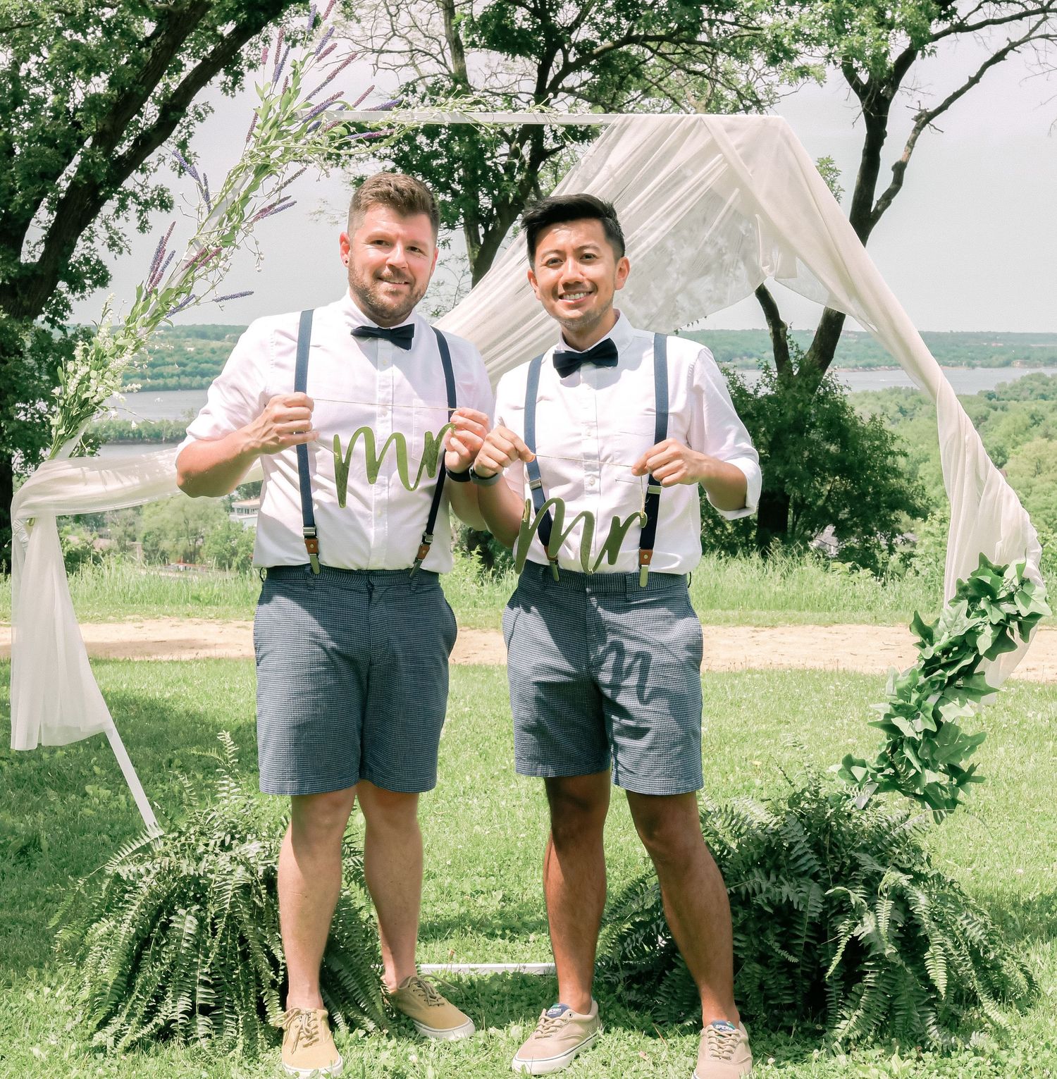 Two families gathered for an outdoor LGBTQ wedding ceremony during COVID in Minnesota, photographed by Isabel Sin Photography.