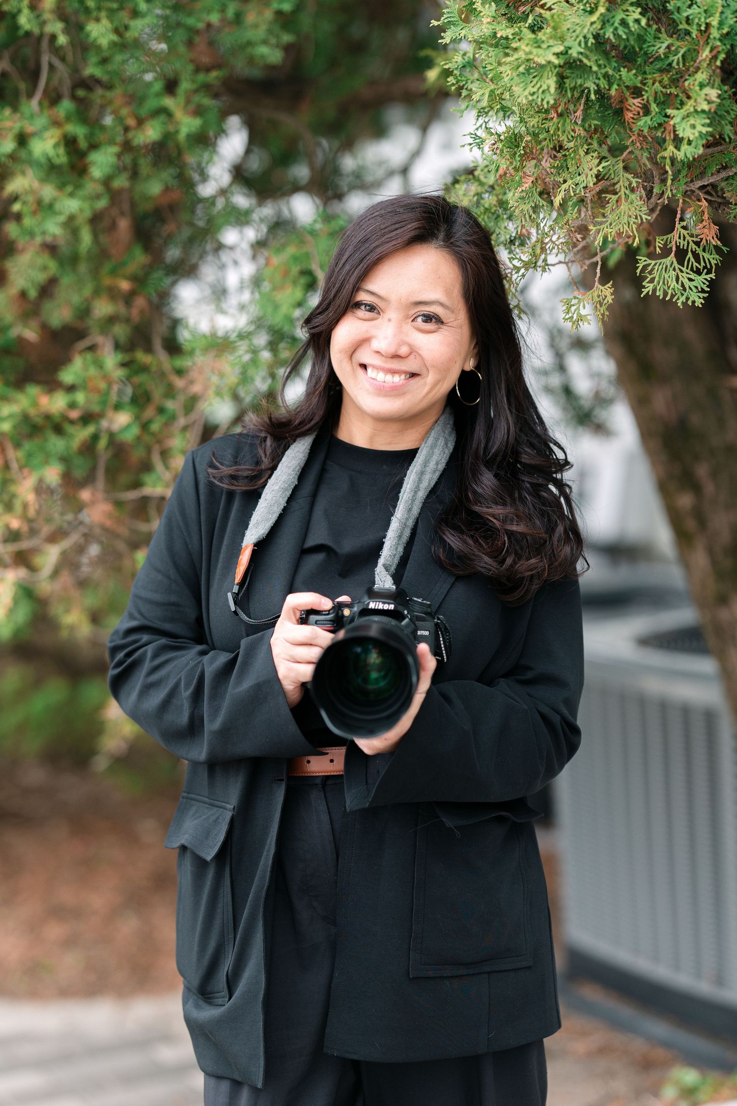 The face of Isabel Sin Photography, local Minnesota Twin Cities photographer based in Saint  Paul.