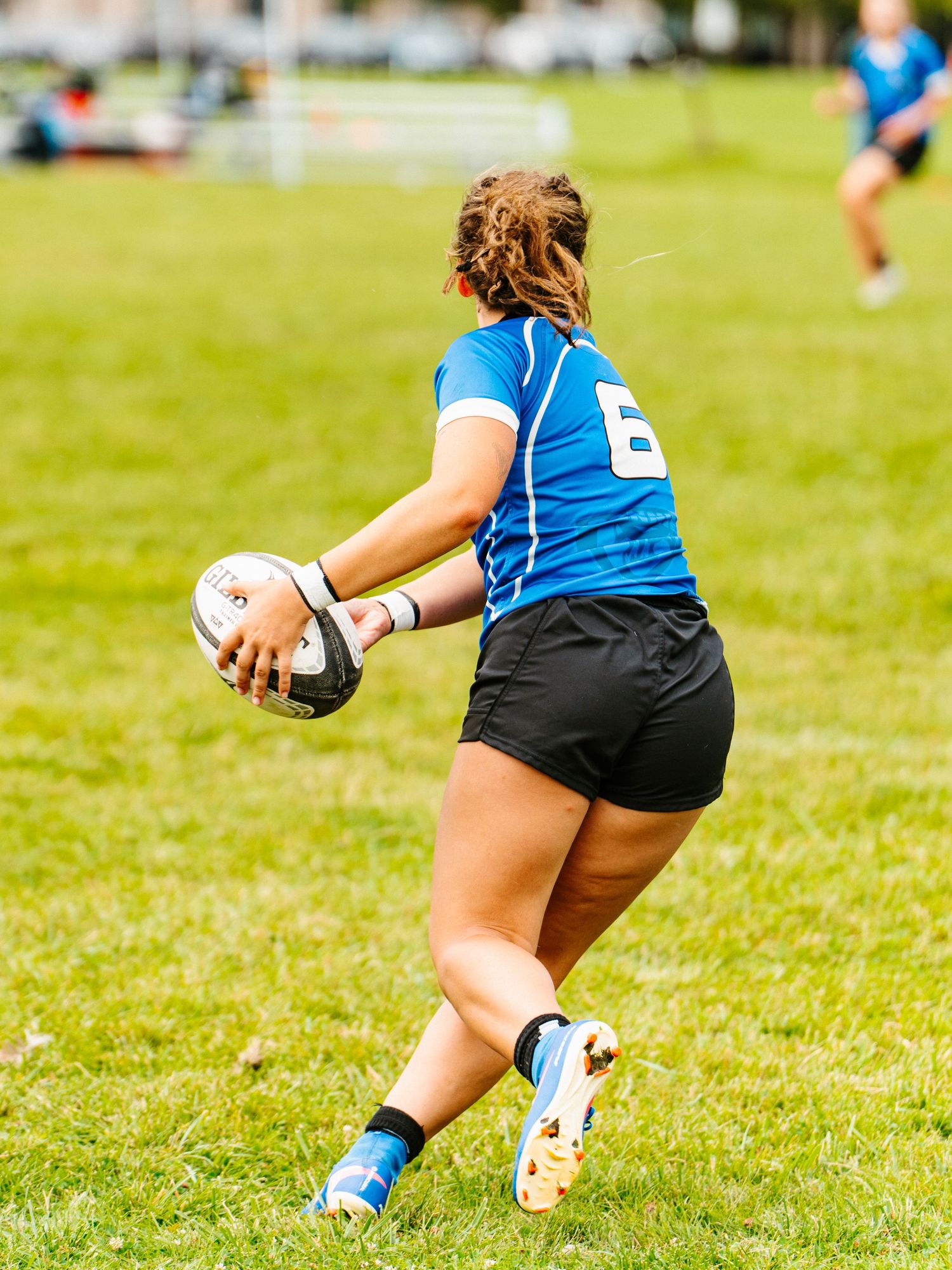 Bonnies Women's Rugby player, Ruby Miscavage, goes for the pass.