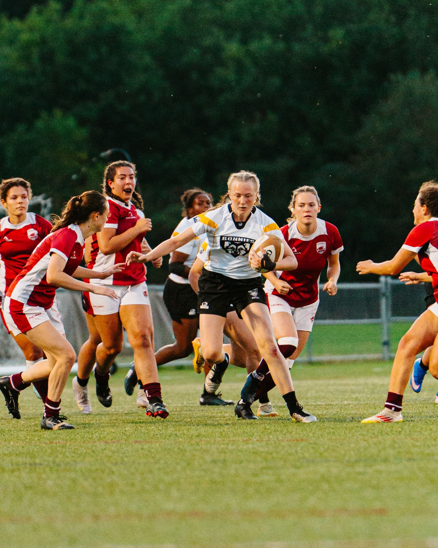 Bonnies Women's Rugby player, Hannah Granelli, powers through the defense.