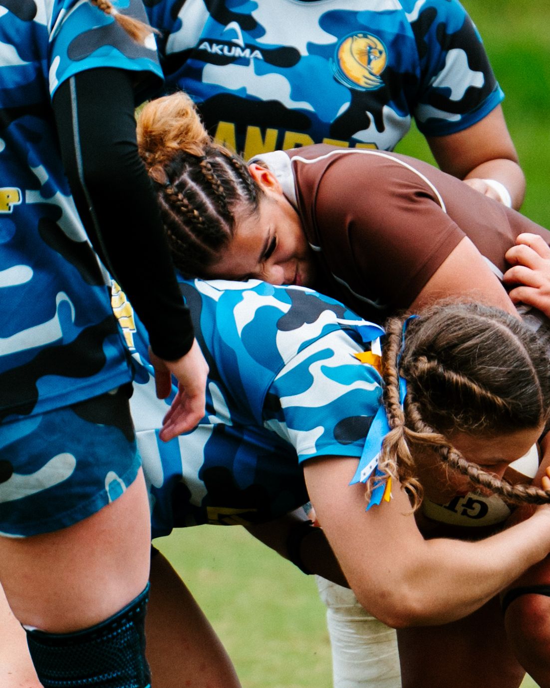 Bonnies Women's Rugby player, Fabi Ballestero, powers through the defense.