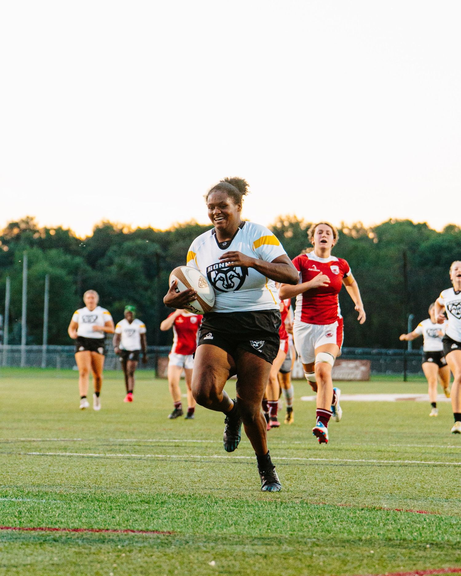 Bonnies Women's Rugby player, Sadie Hersehberger, sprints to the try zone.