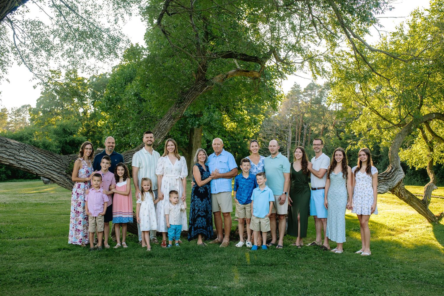 Extended Family pose together at Bond LAke in niagara county during their family portrait session