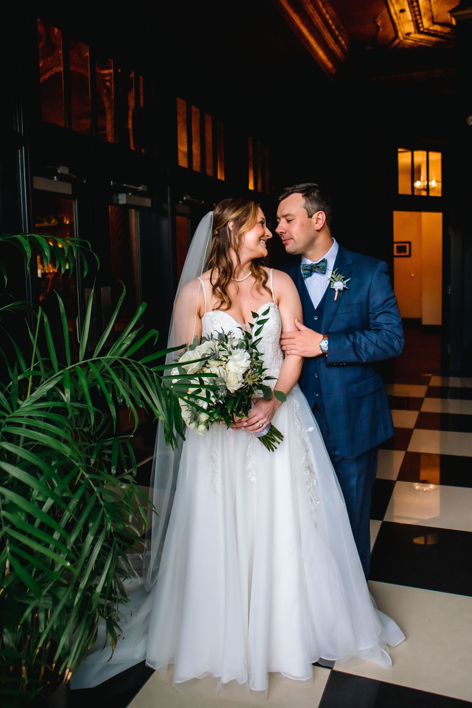 Bride and Groom gaze lovingly at each other at their wedding at The Show at Shea's Seneca.