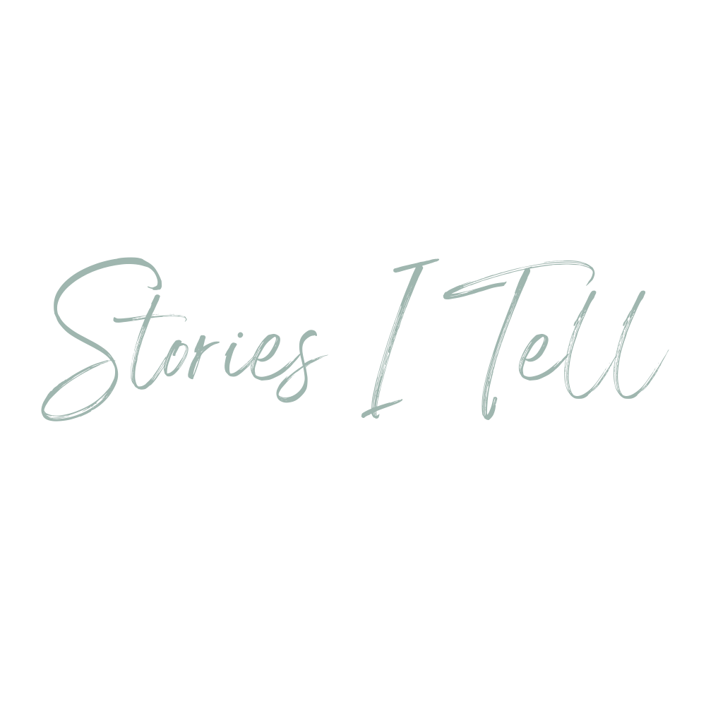 Decorative text overlay reading 'Stories I Tell' in soft teal calligraphy.
