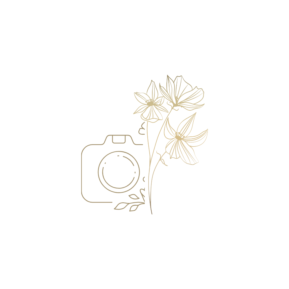 Gold line art logo featuring a camera with floral botanical elements, elegant minimalist design on white background.
