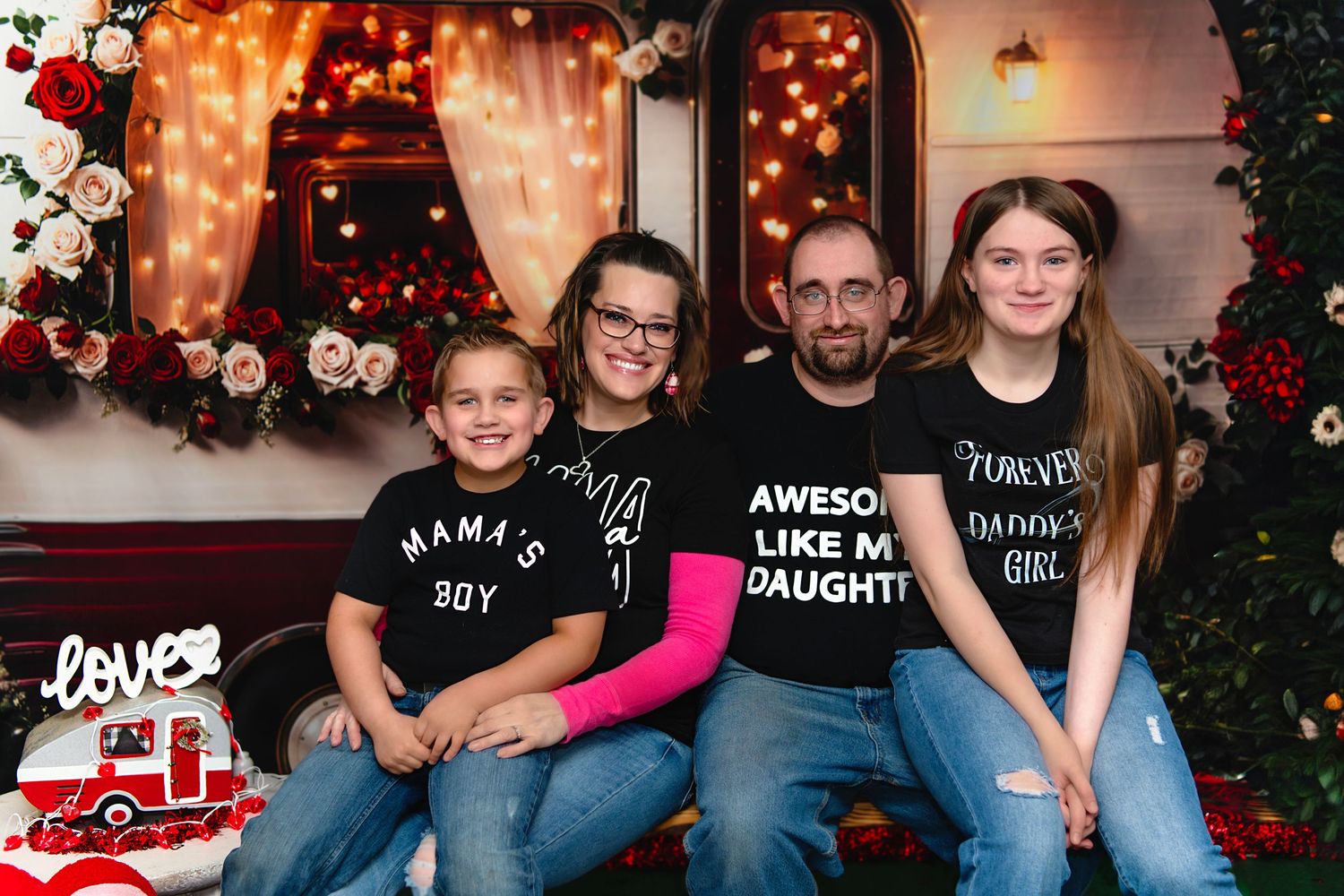 family photo in front of camper