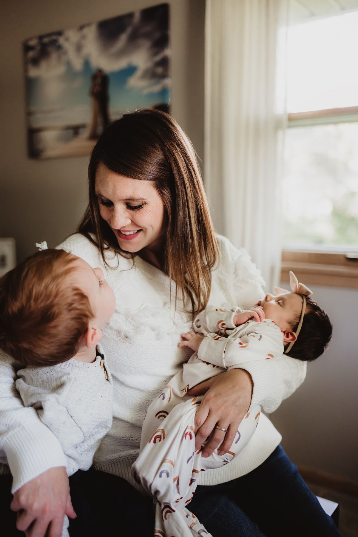 Candid lifestyle portrait of joyful family interaction near window.