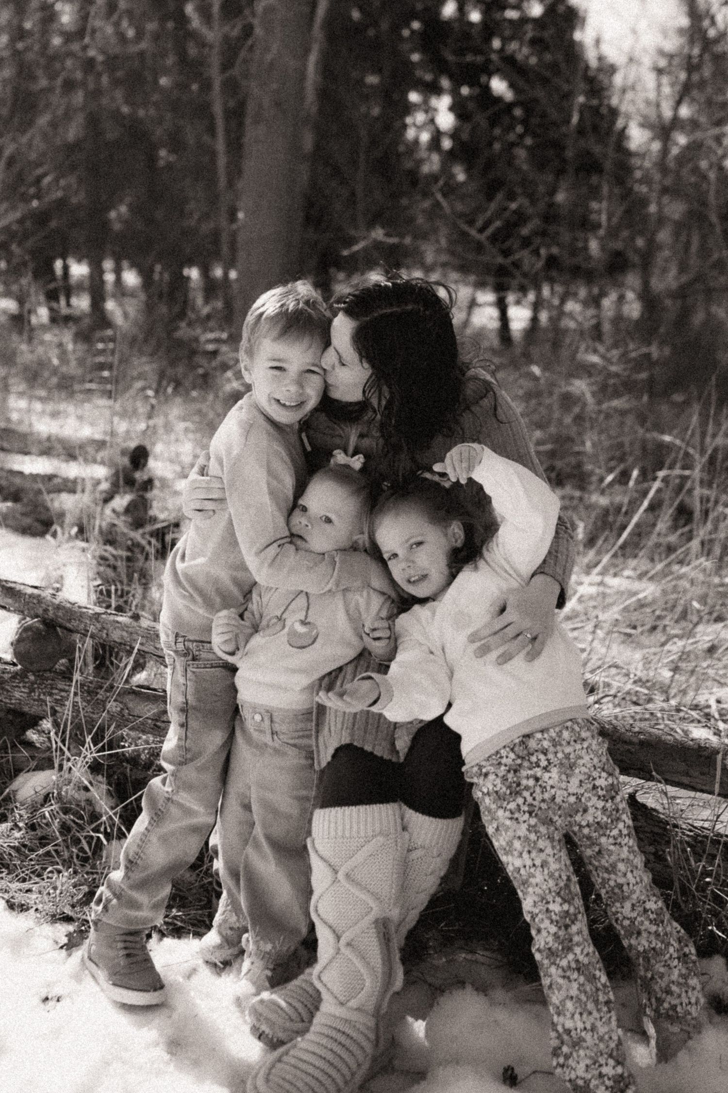 A heartwarming series of candid family moments captured in a snowy winter setting.