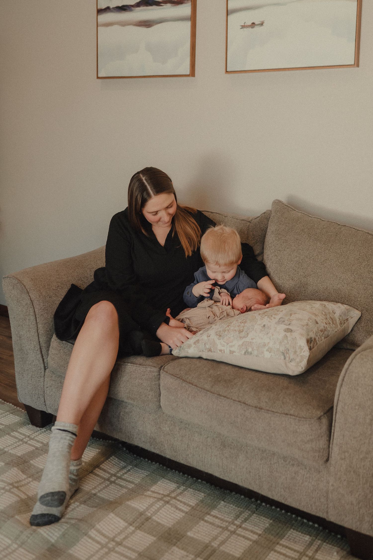 A sequence of photos showing someone reclining on a gray couch in a minimalist room setting.