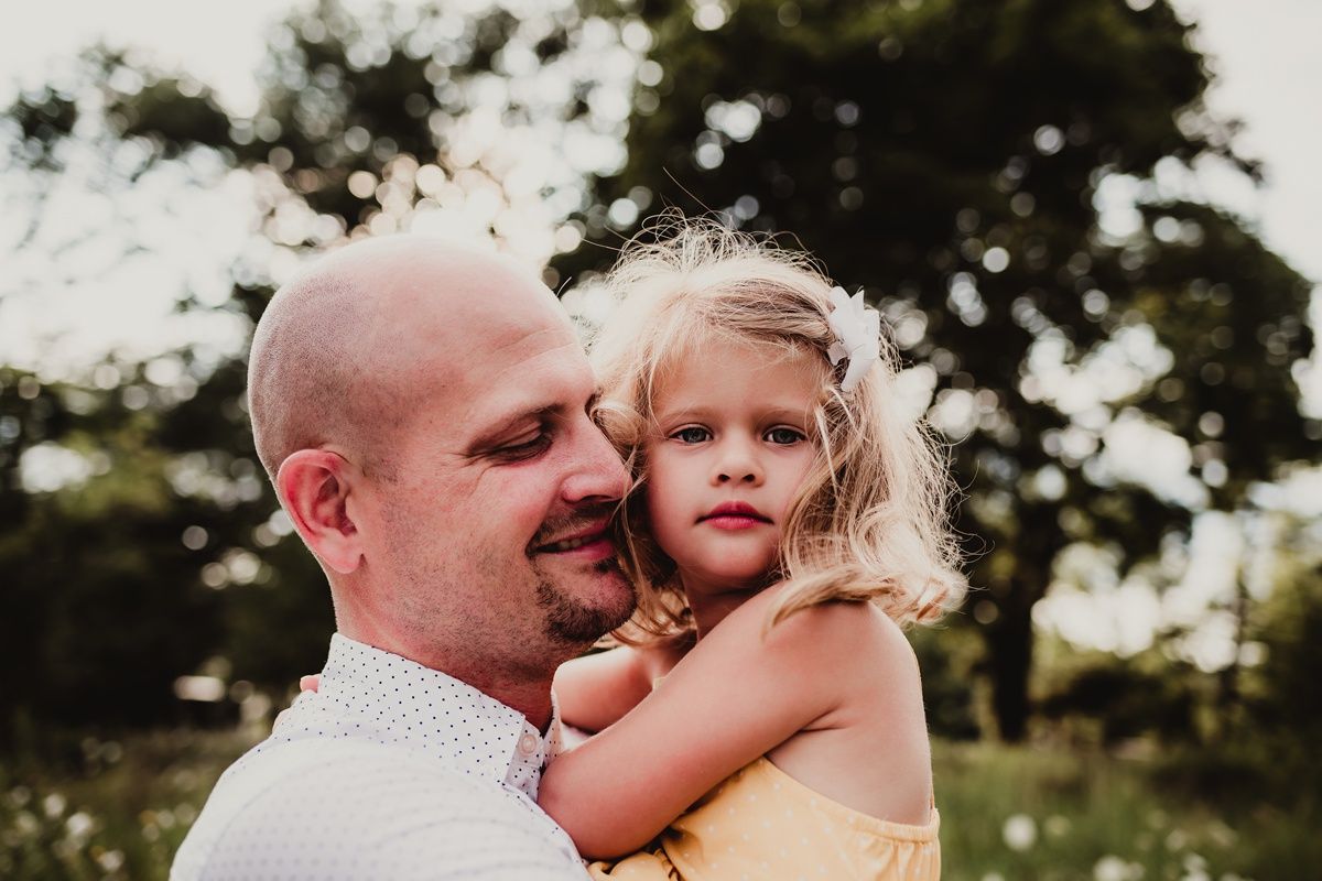 Intimate outdoor portrait showing warm emotional connection.
