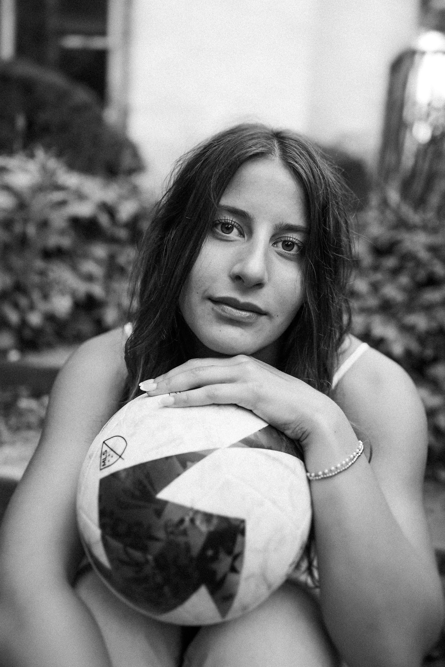 Black and white artistic portraits showing dramatic lighting and expressions.