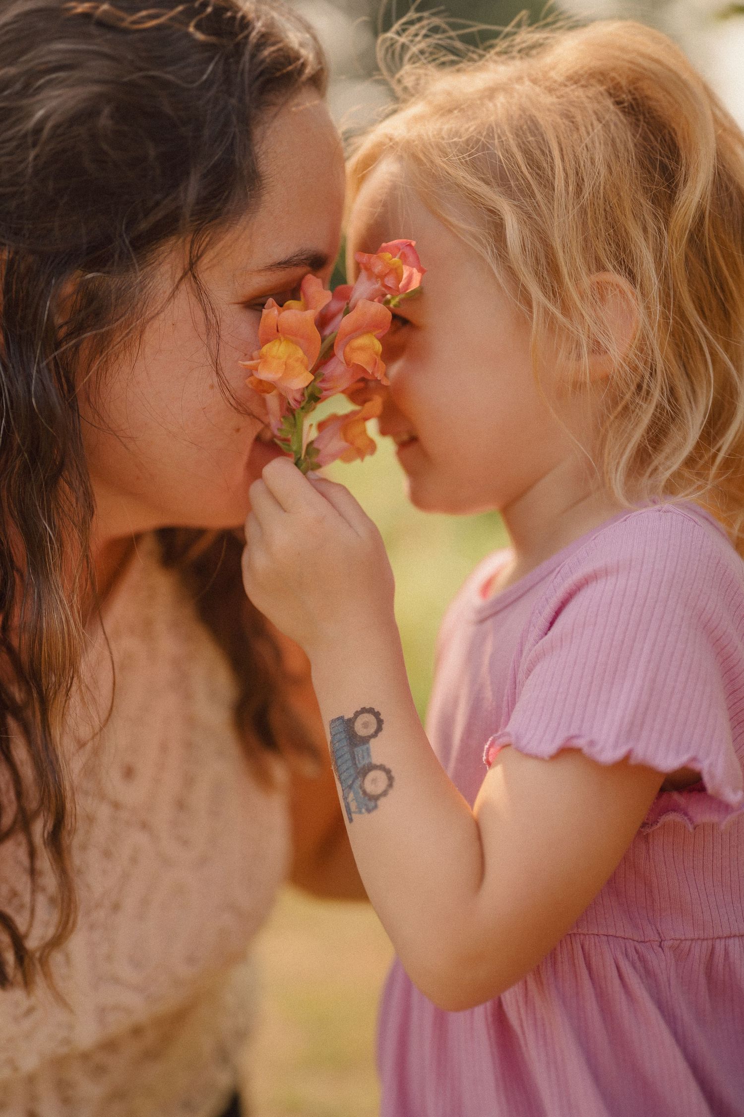 A tender moment between parent and child in close-up showing emotion and connection in natural lighting.