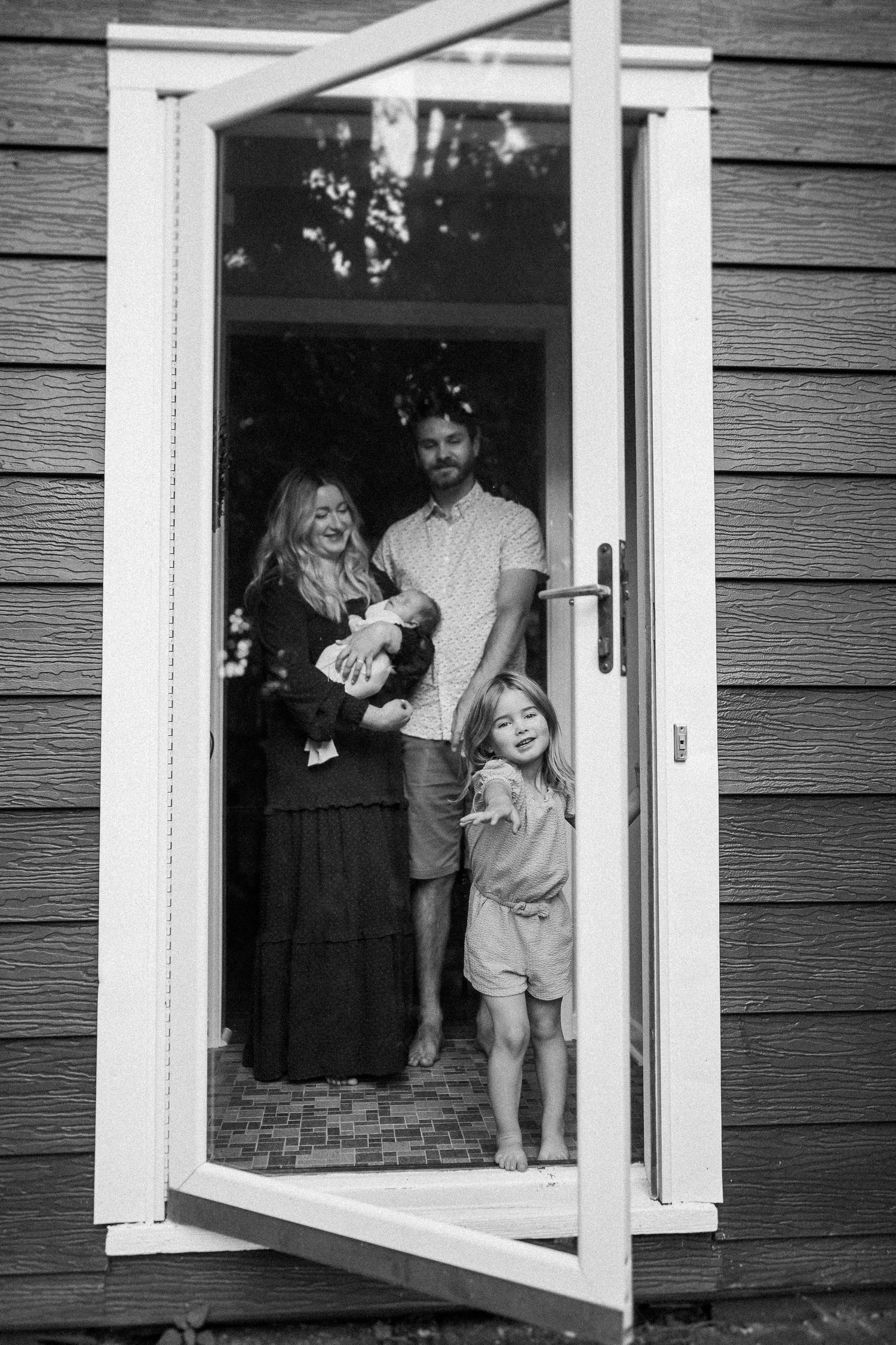 Series of photos capturing moments through a white-framed window against dark siding.
