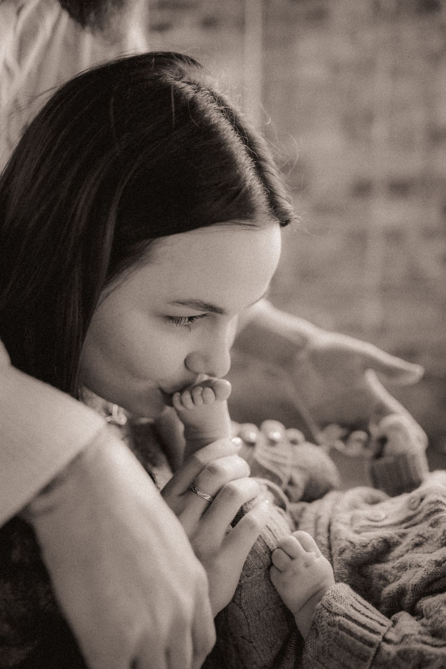 Intimate black and white photo sequence showing emotional moments and expressions.