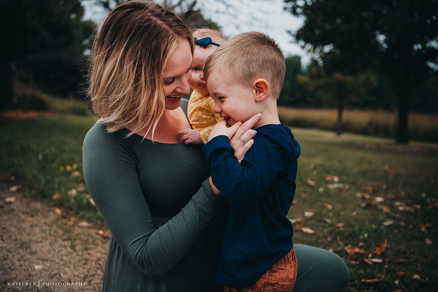 An intimate autumn portrait with joyful expressions and laughter.