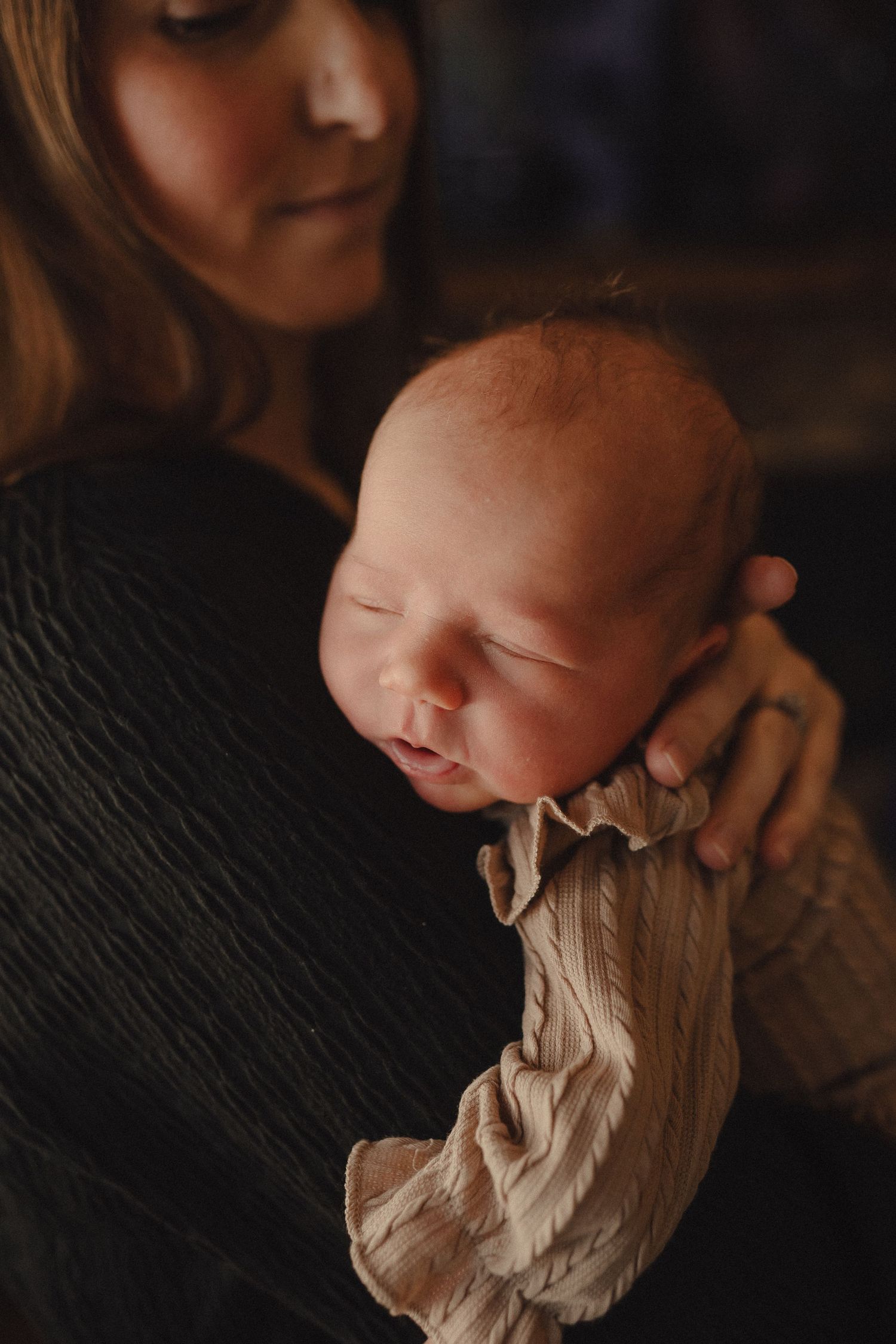 Dramatic close-up photos showing interaction with textured fabric in dark moody lighting.