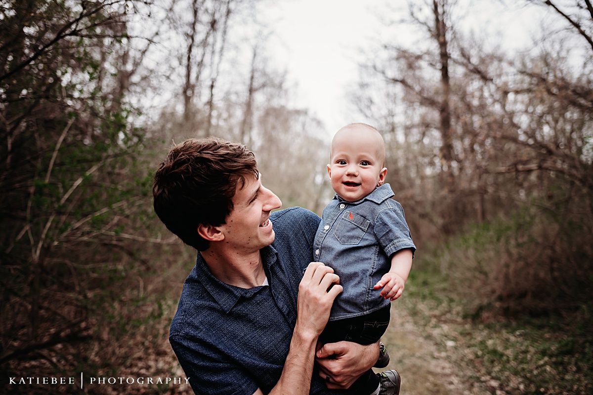 Candid moment of joy captured on natural trail.