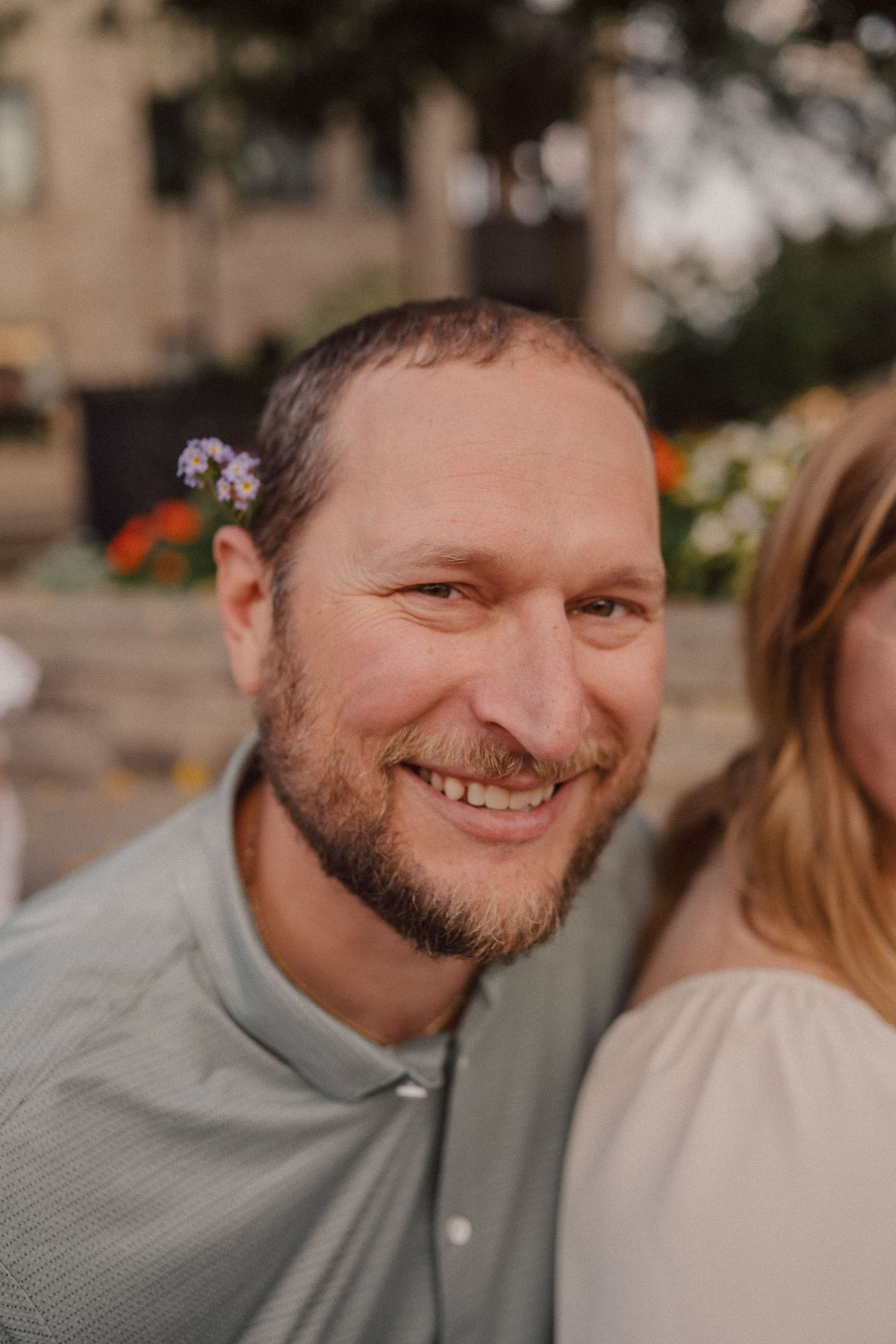 A close-up portrait series showing warm expressions in natural lighting.