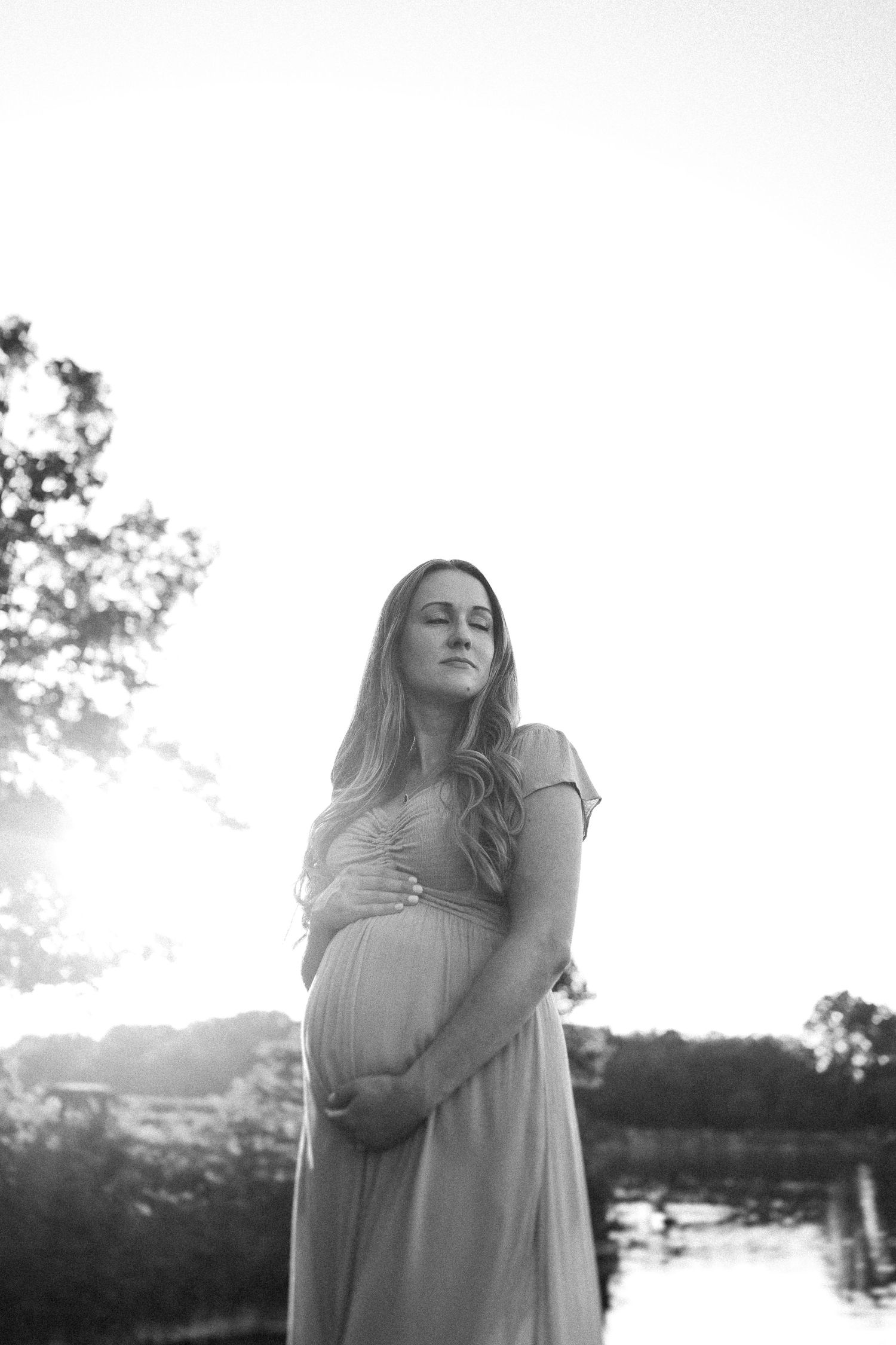 Artistic monochrome portraits capturing ethereal poses in natural light against a light background.