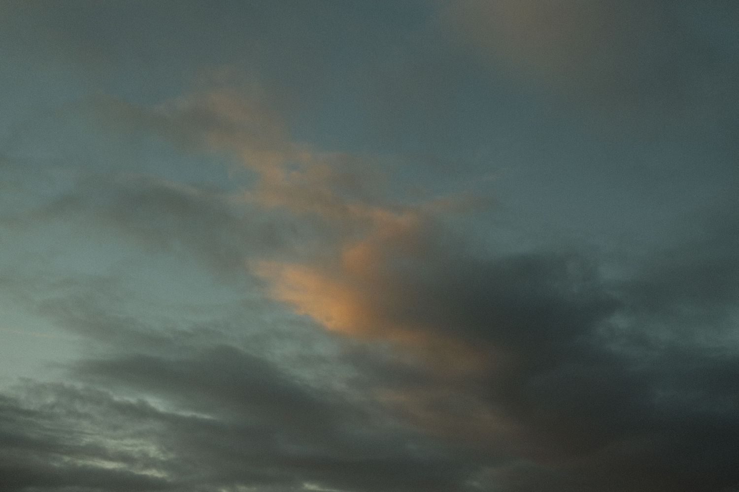 Sunshine Coast real estate photography: moody sunset sky over a luxury residential rooftop during a premium property marketing shoot