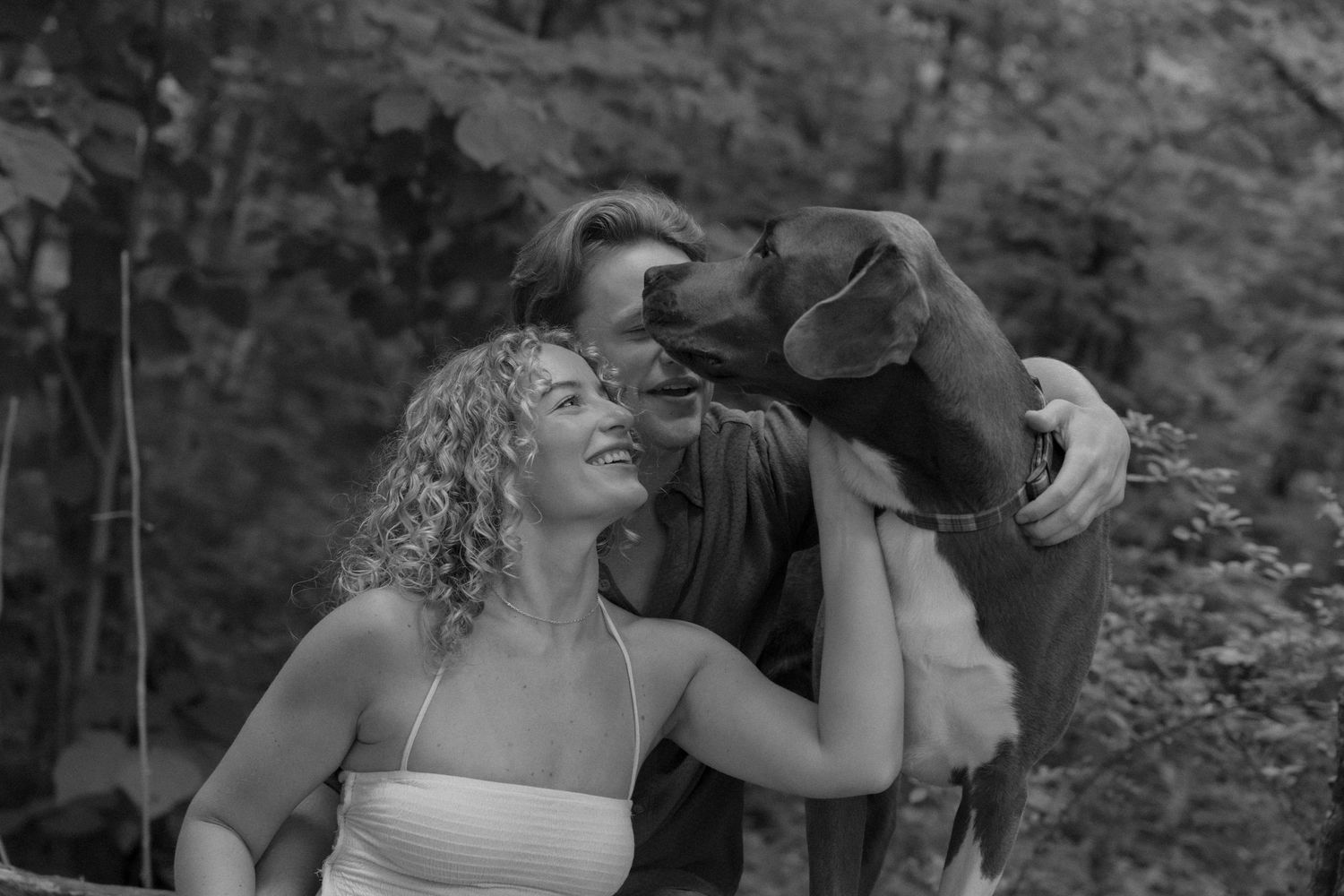 Black and white photo sequence capturing intimate romantic moments between a couple.