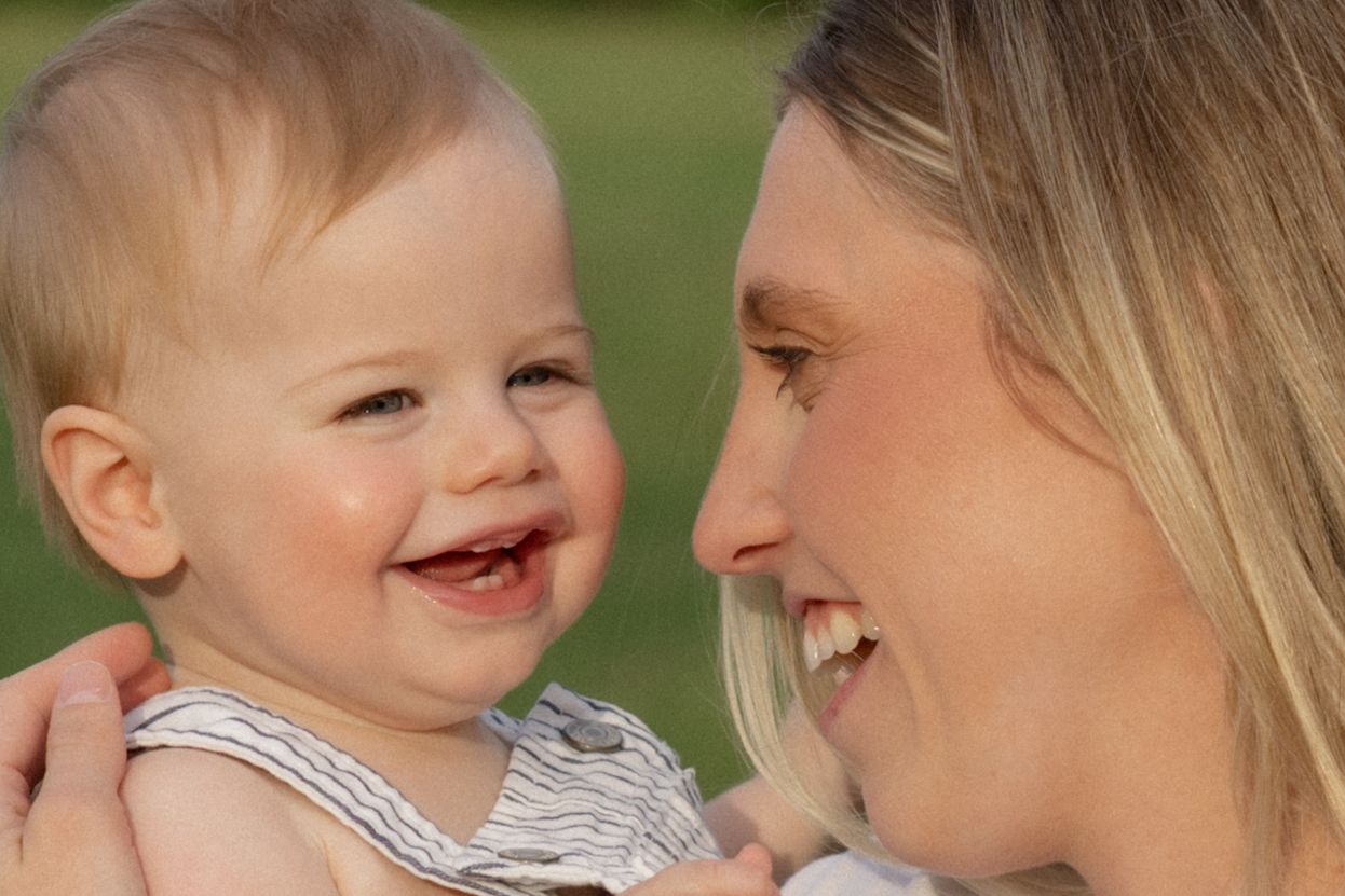 Close-up of joyful family moments captured in a natural outdoor setting.