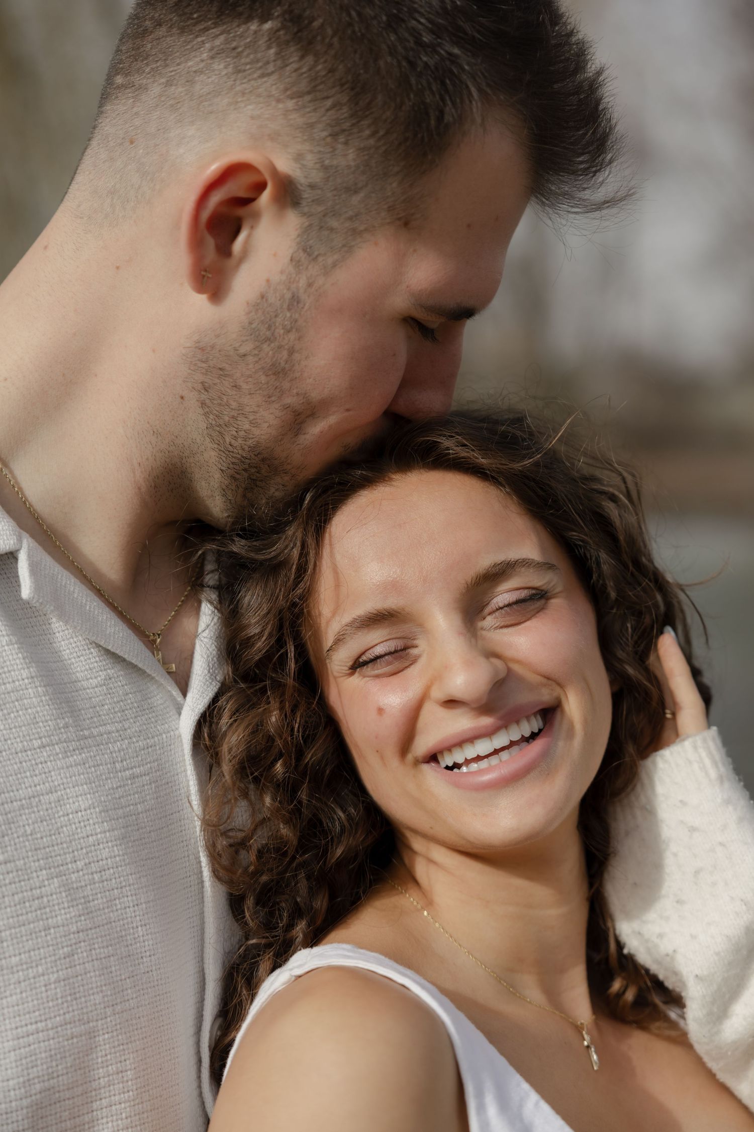 A series of intimate close-up portraits capturing joyful expressions and tender moments.