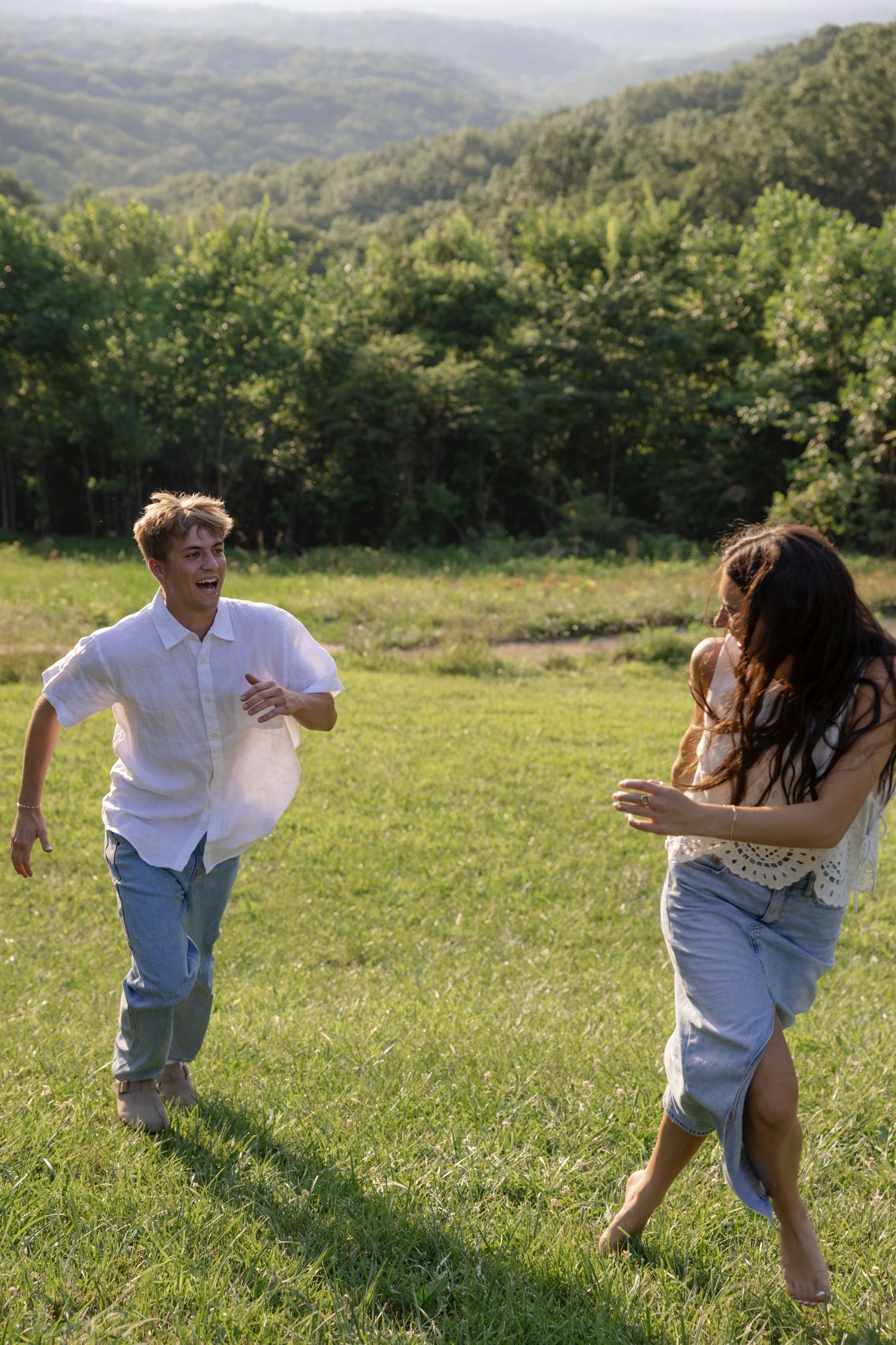 A dynamic sequence of joyful movement and dance in a sun-filled meadow with rolling hills.