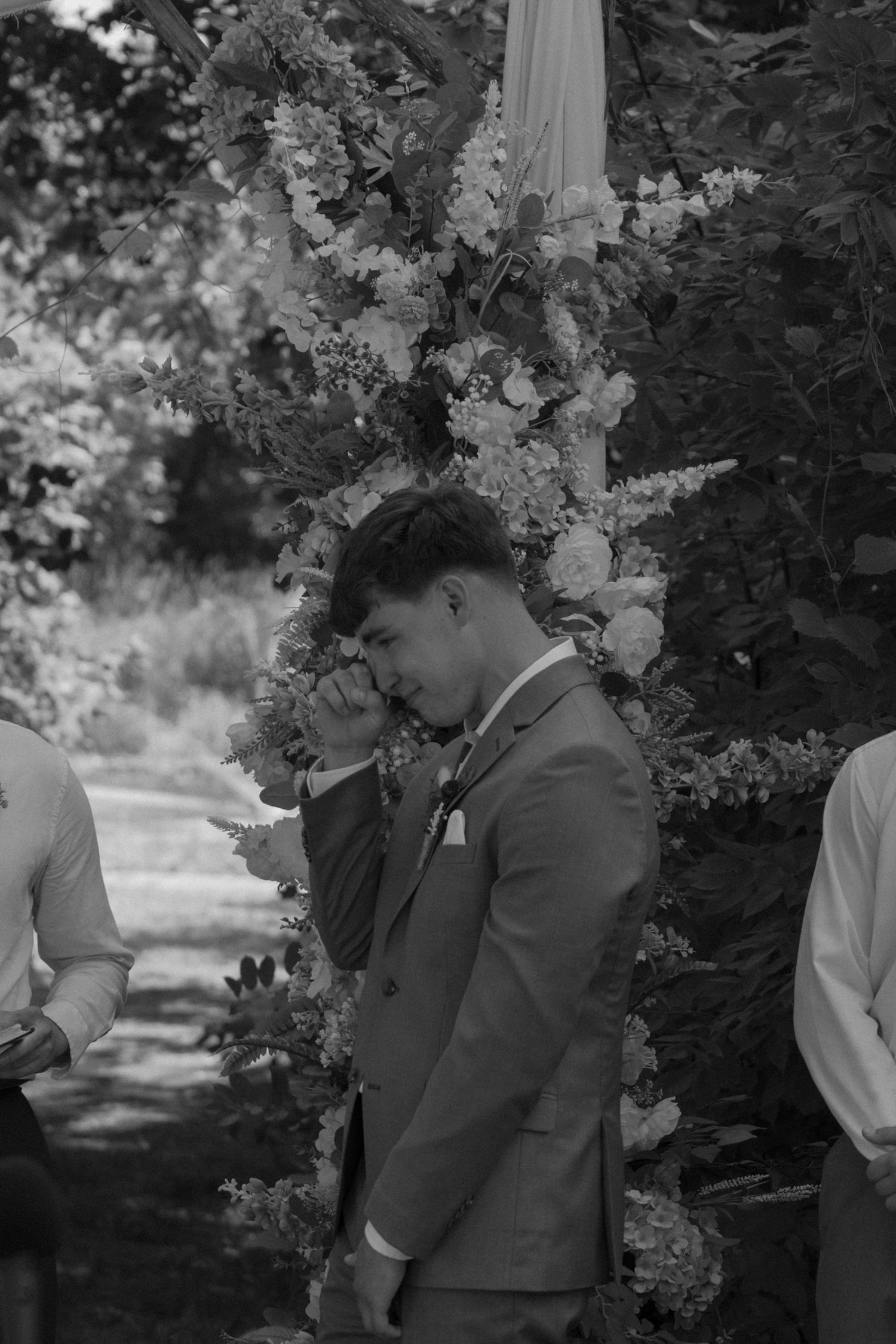 A beautiful outdoor wedding ceremony captured in a black and white photo montage.