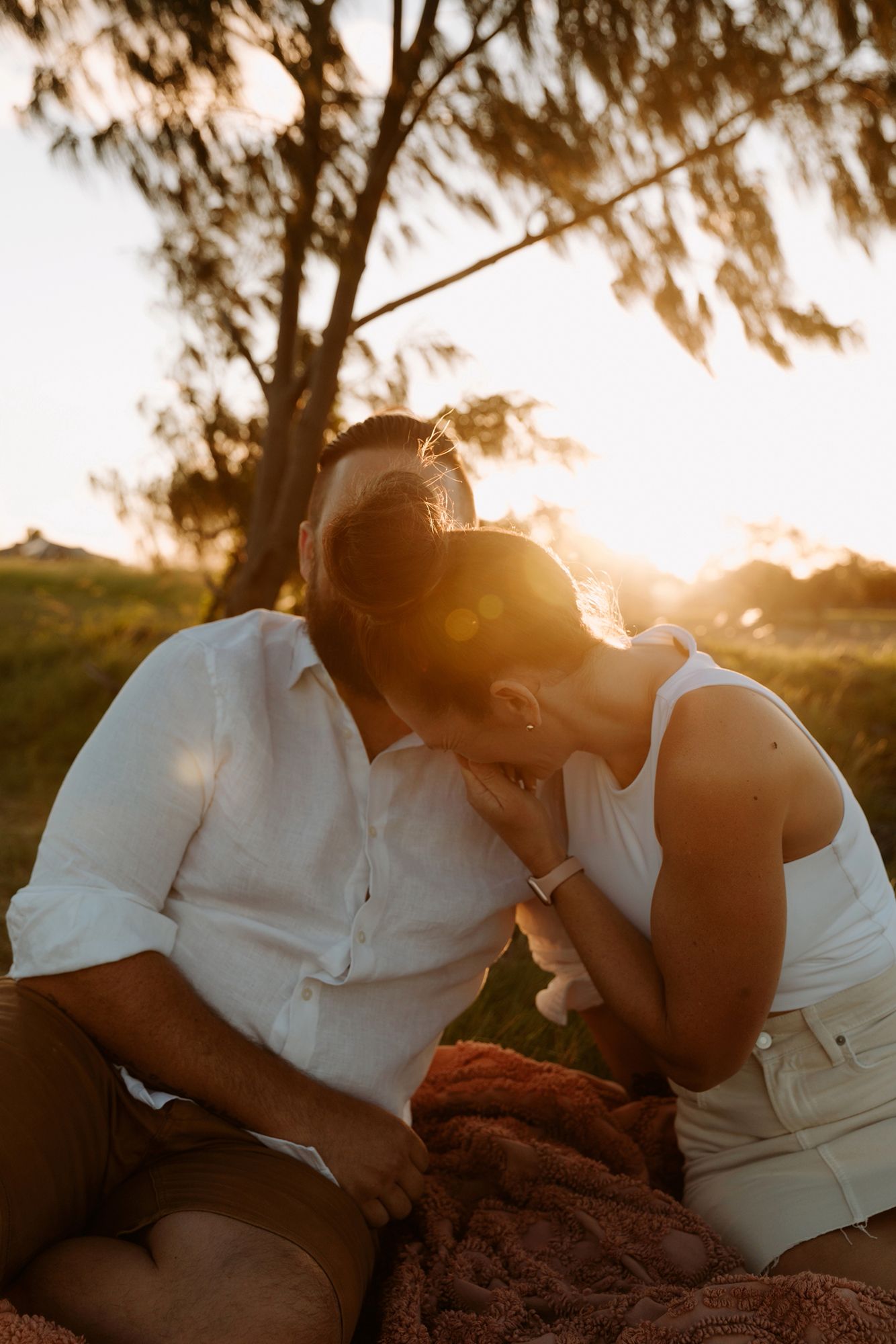 Candid couple photography during sunset at Cleveland, Redlands, Queensland.