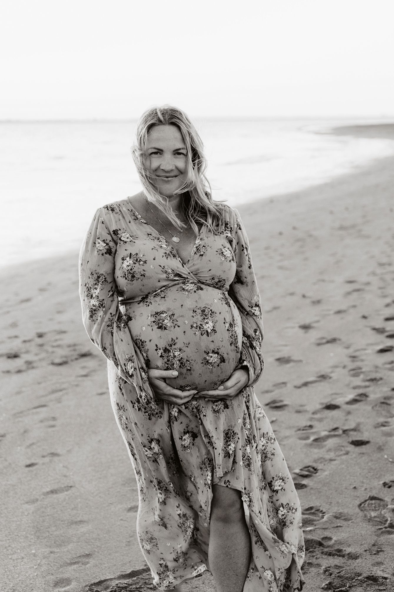 Artistic black and white maternity photoshoot at Wellington Point beach.