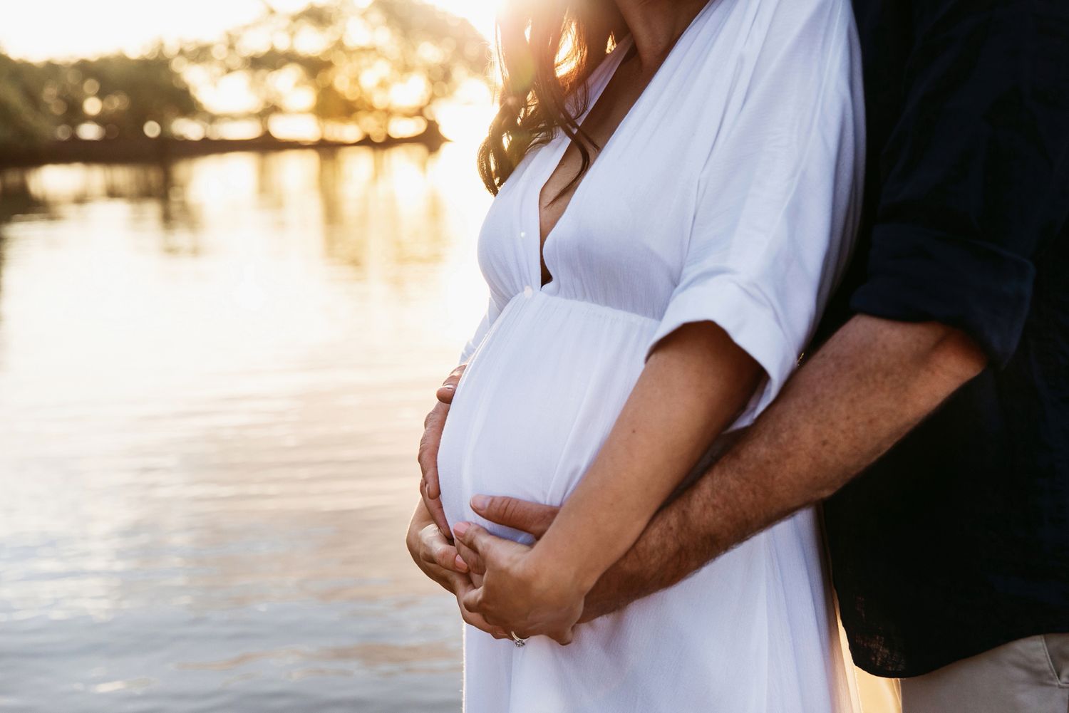 Maternity photography at Cleveland, Redlands beach by the water.
