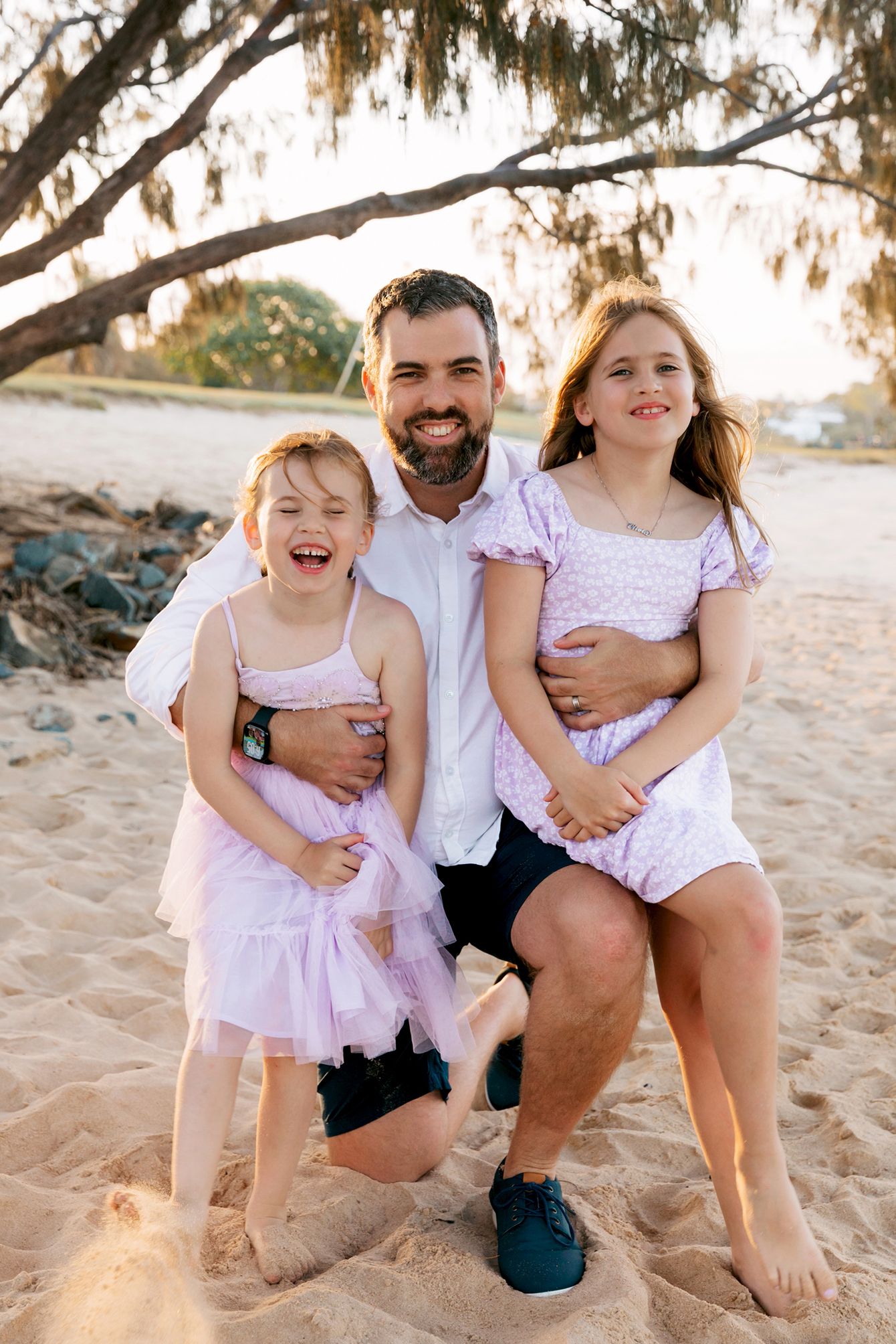 Father and daughter photoshoot on Raby Bay beach.