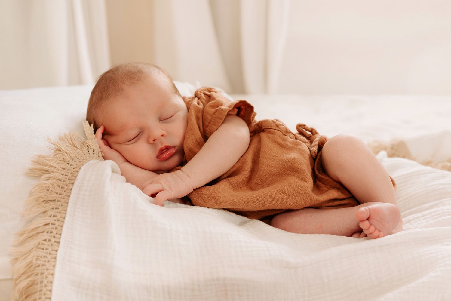 Peaceful newborn baby portrait photography in soft natural light at Brisbane home.