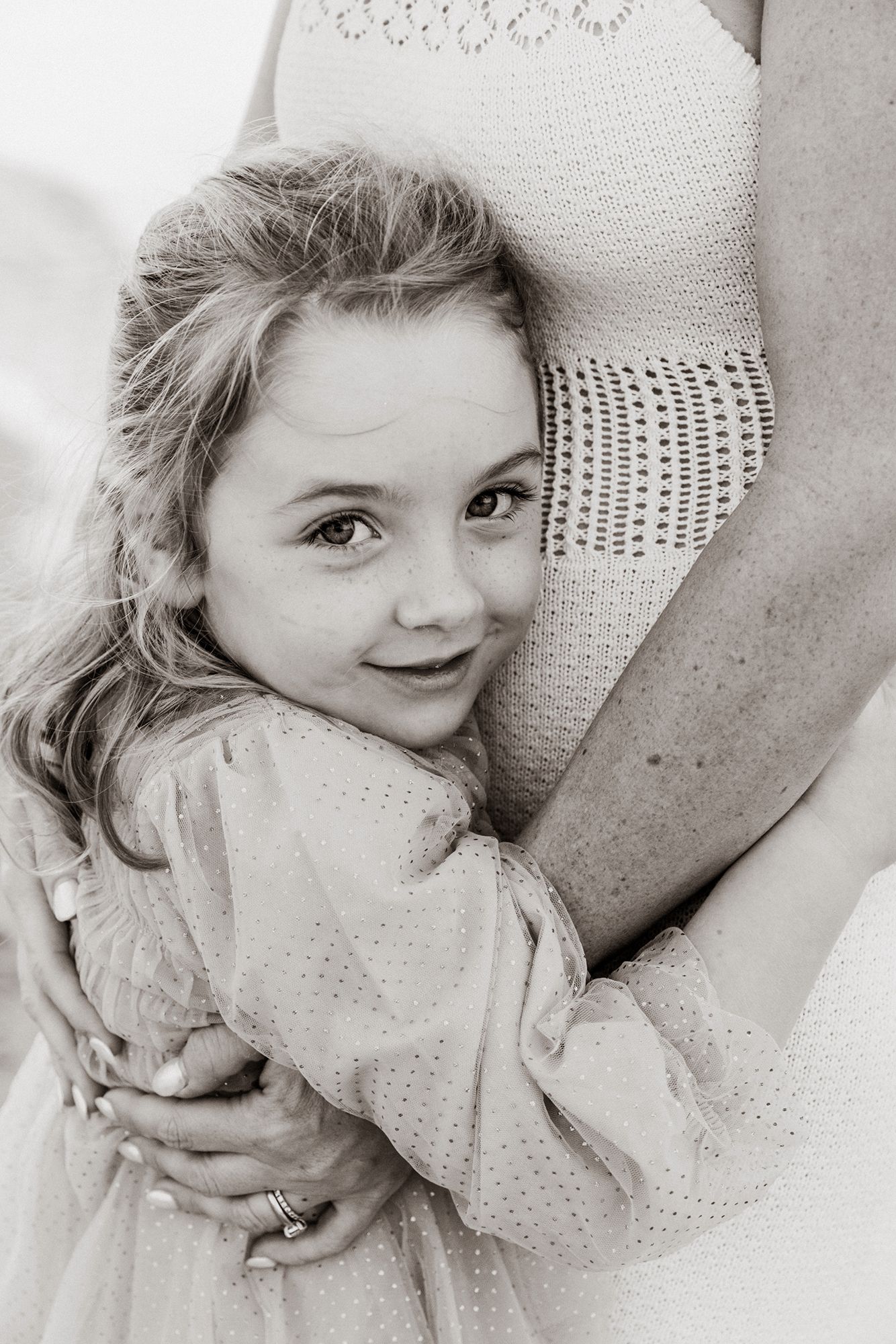 Family photographer located in Redlands, bayside of Brisbane specialising in family portraits like this timeless black and white photograph.