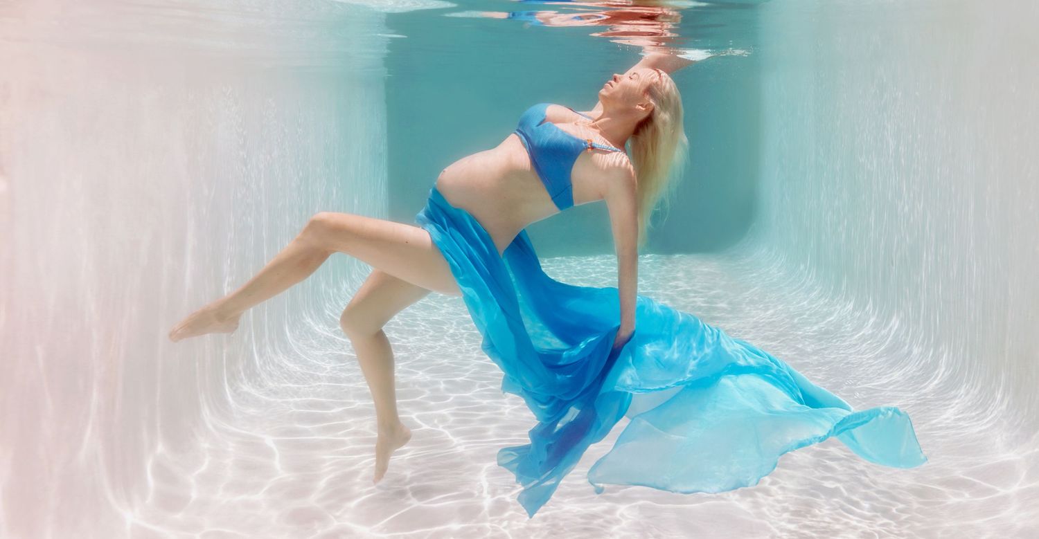 Artistic under water maternity photography Brisbane.
