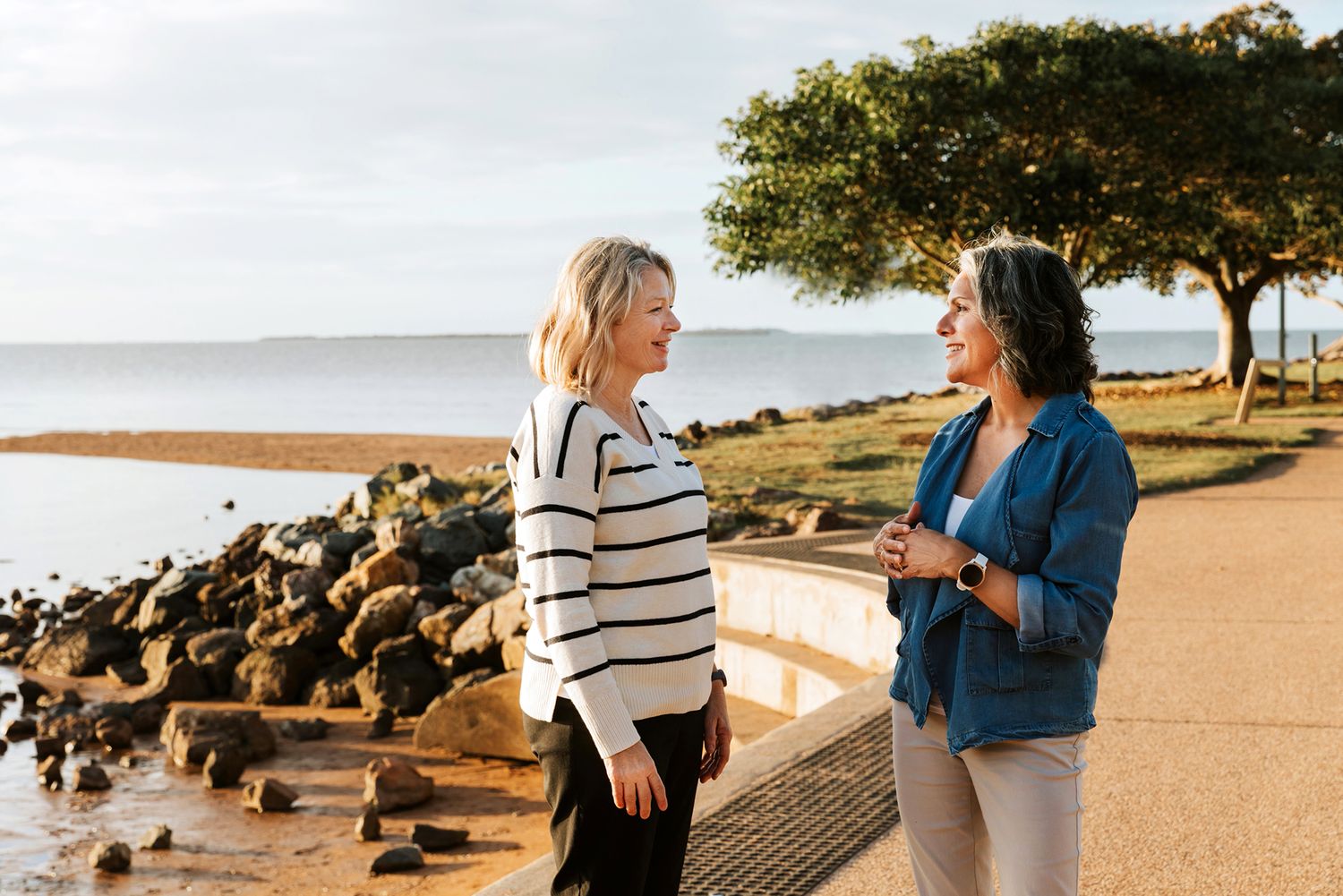 Wellington Point business photographer illustrating two people having a comfortable conversation for counselling service.