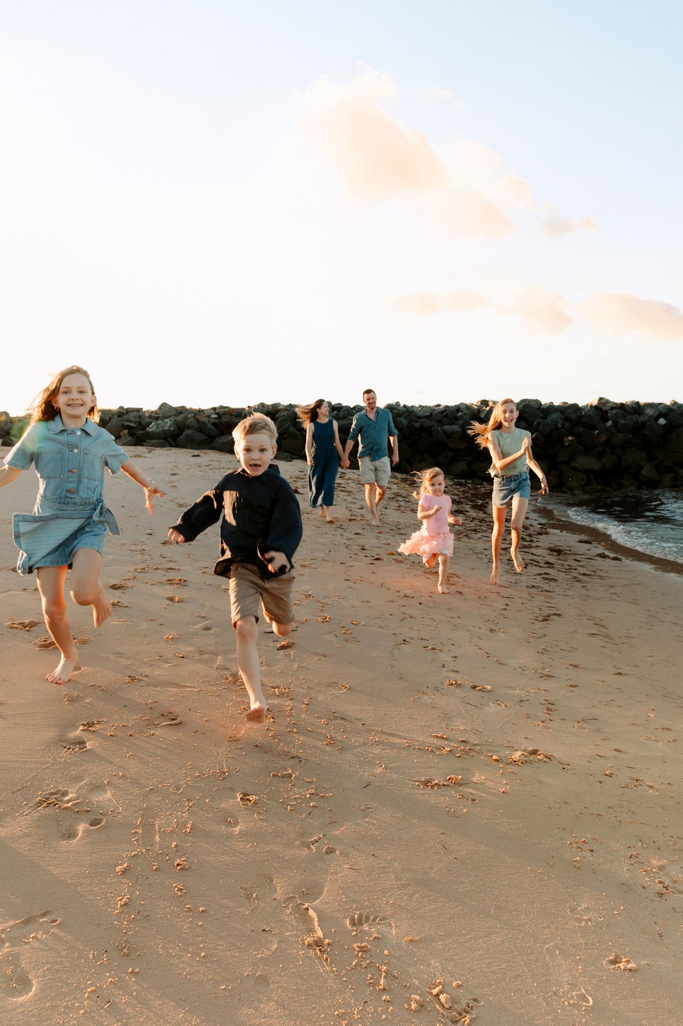 Real and authentic family photoshoot at Raby Bay beach.