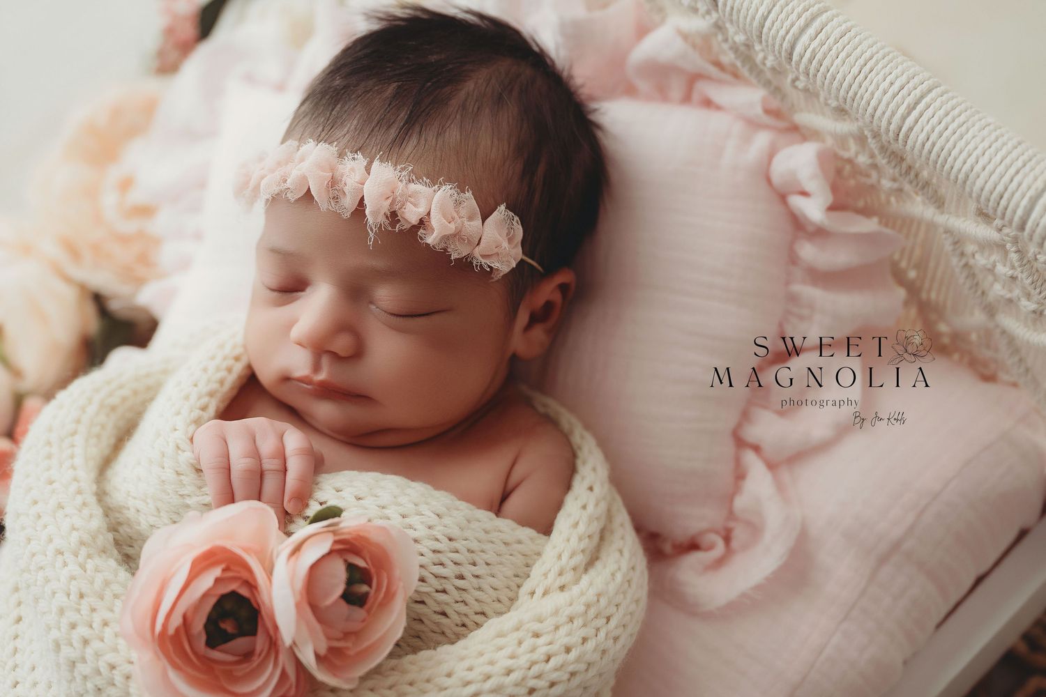 Dreamy newborn photo collection featuring pink roses and delicate fabrics.