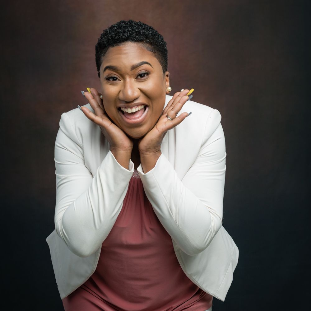 Professional portrait series showing joyful expressions in burgundy top and white jacket against dark background.