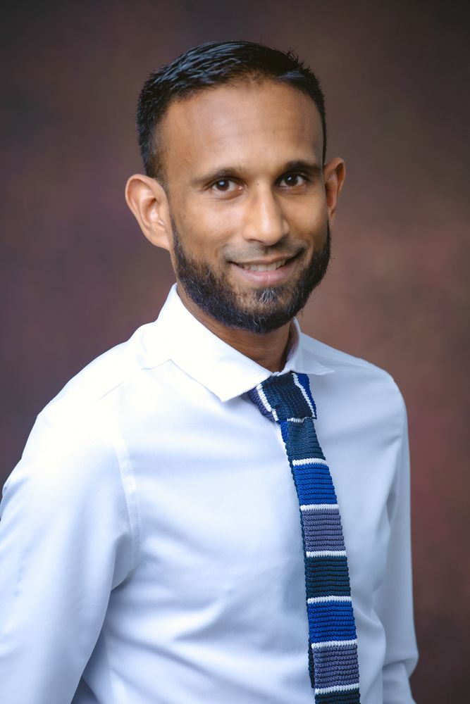 Professional headshot series showing a person in a white dress shirt and navy striped tie against a dark background.