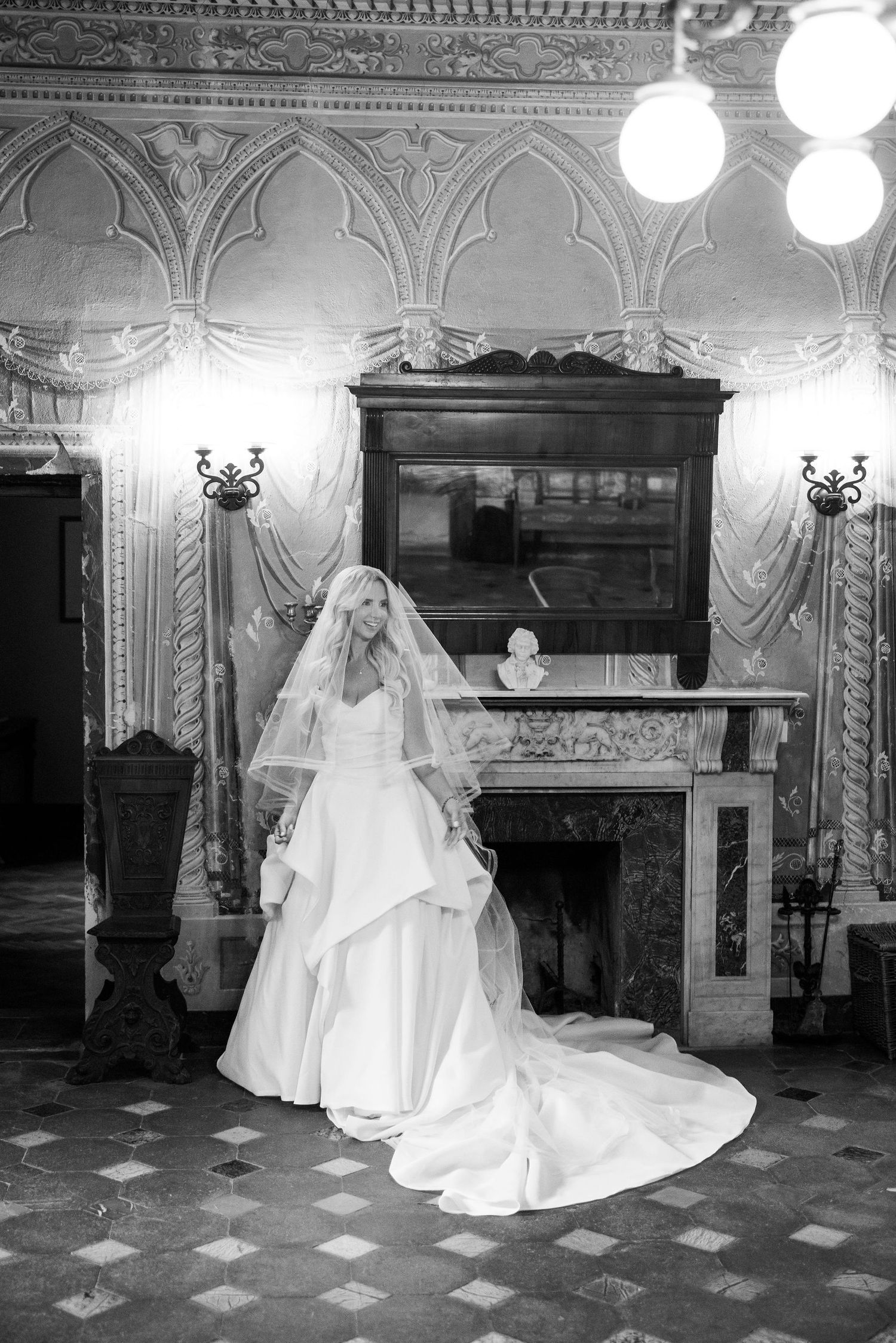 A figure in a flowing white wedding dress and veil poses in different positions against an ornate interior with a fireplace.