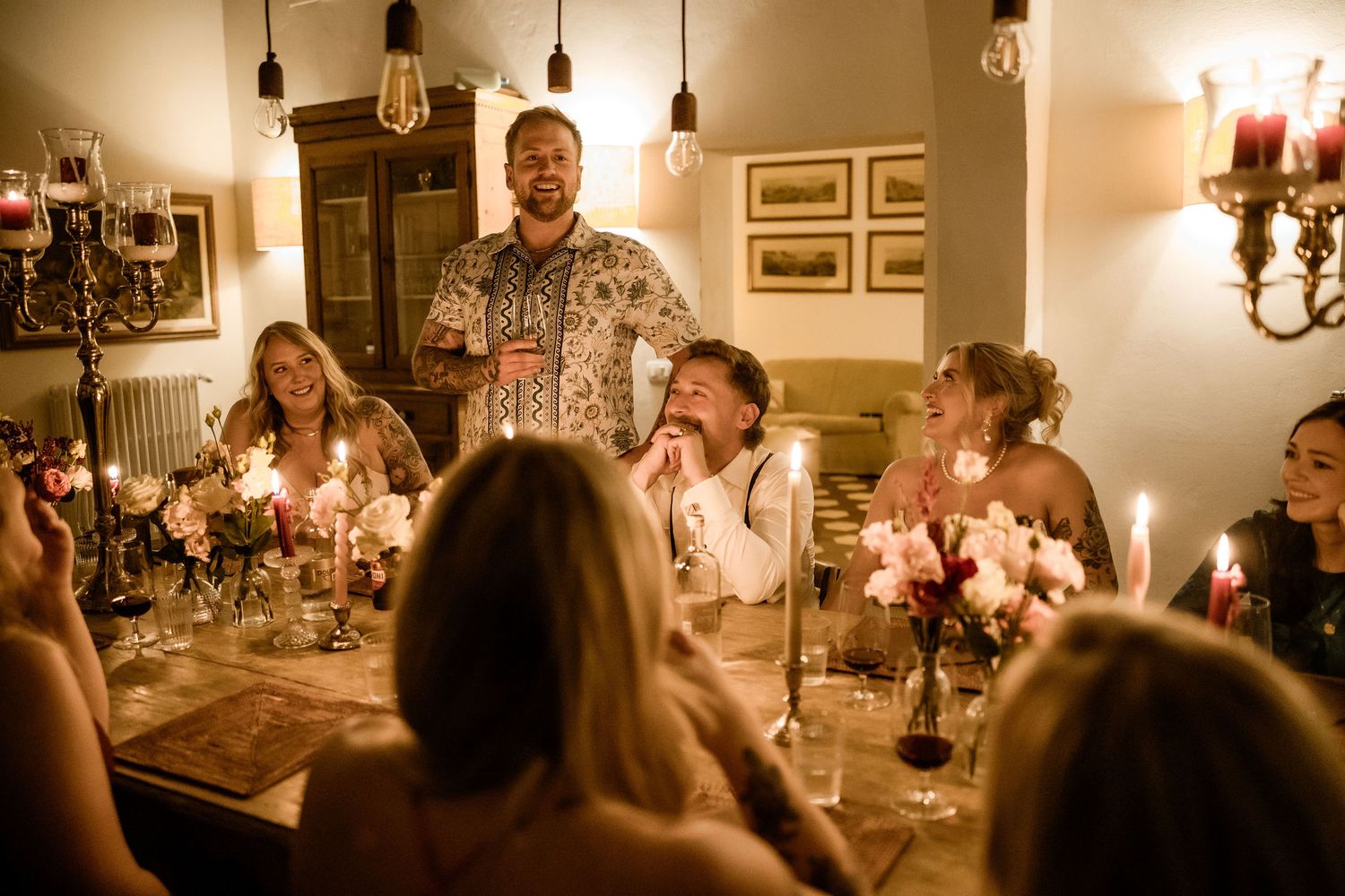 A collage of four candlelit dining scenes showing people enjoying an intimate restaurant atmosphere.