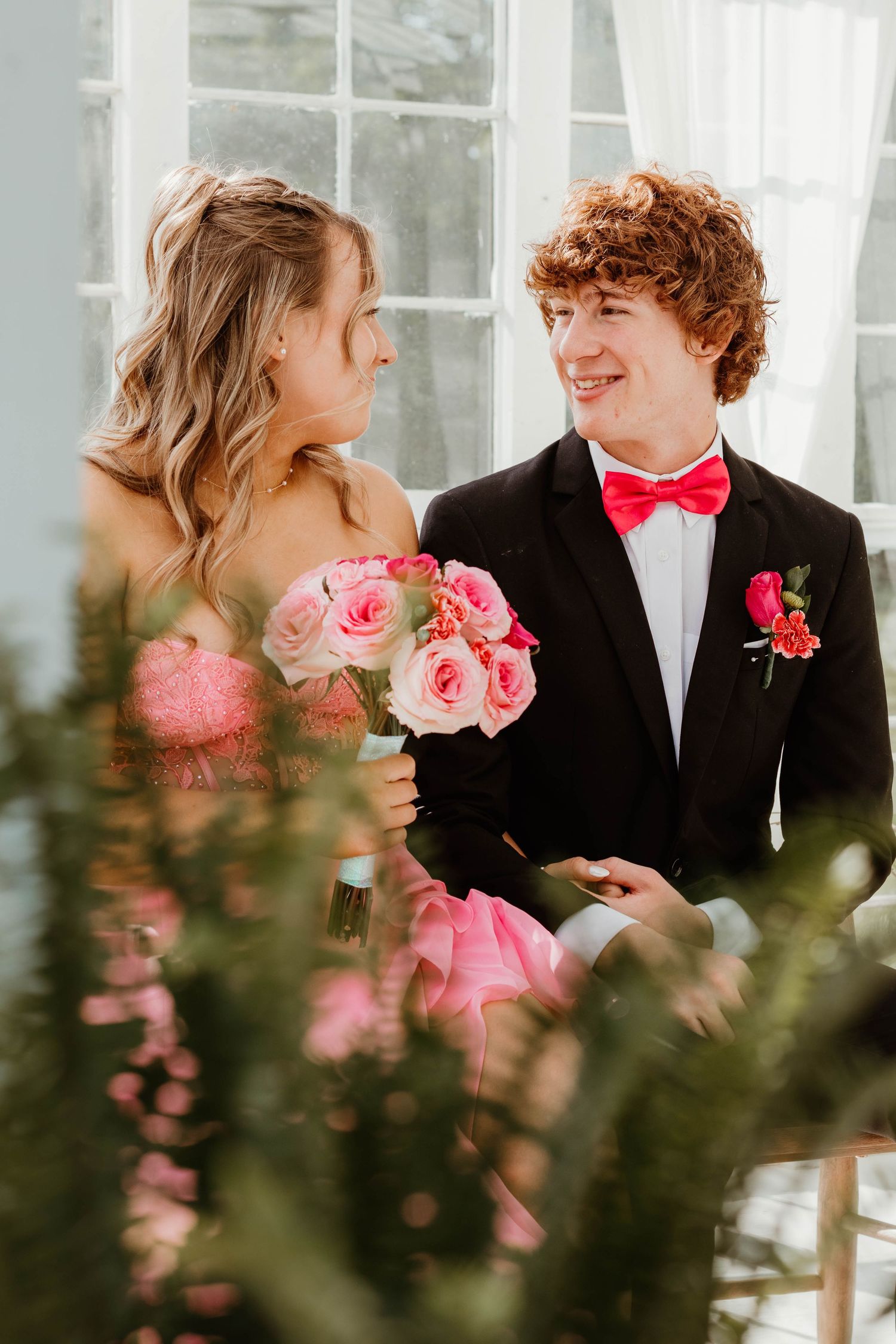 Elegant pink roses and formal attire couple portraits in a greenhouse in northeast Georgia.