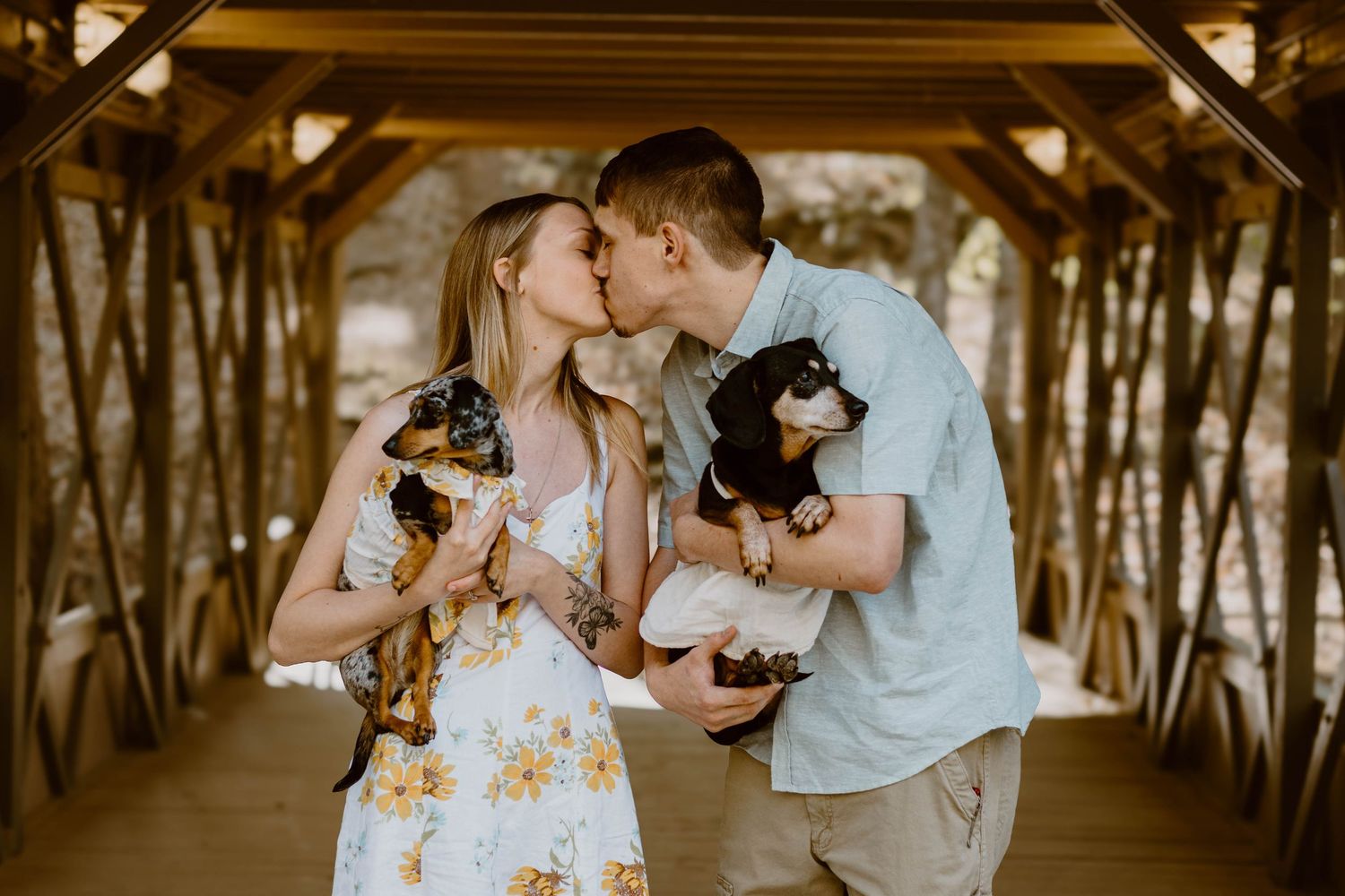 Romantic sepia-toned portraits under a wooden pergola at Henderson Falls Park in north Georgia..