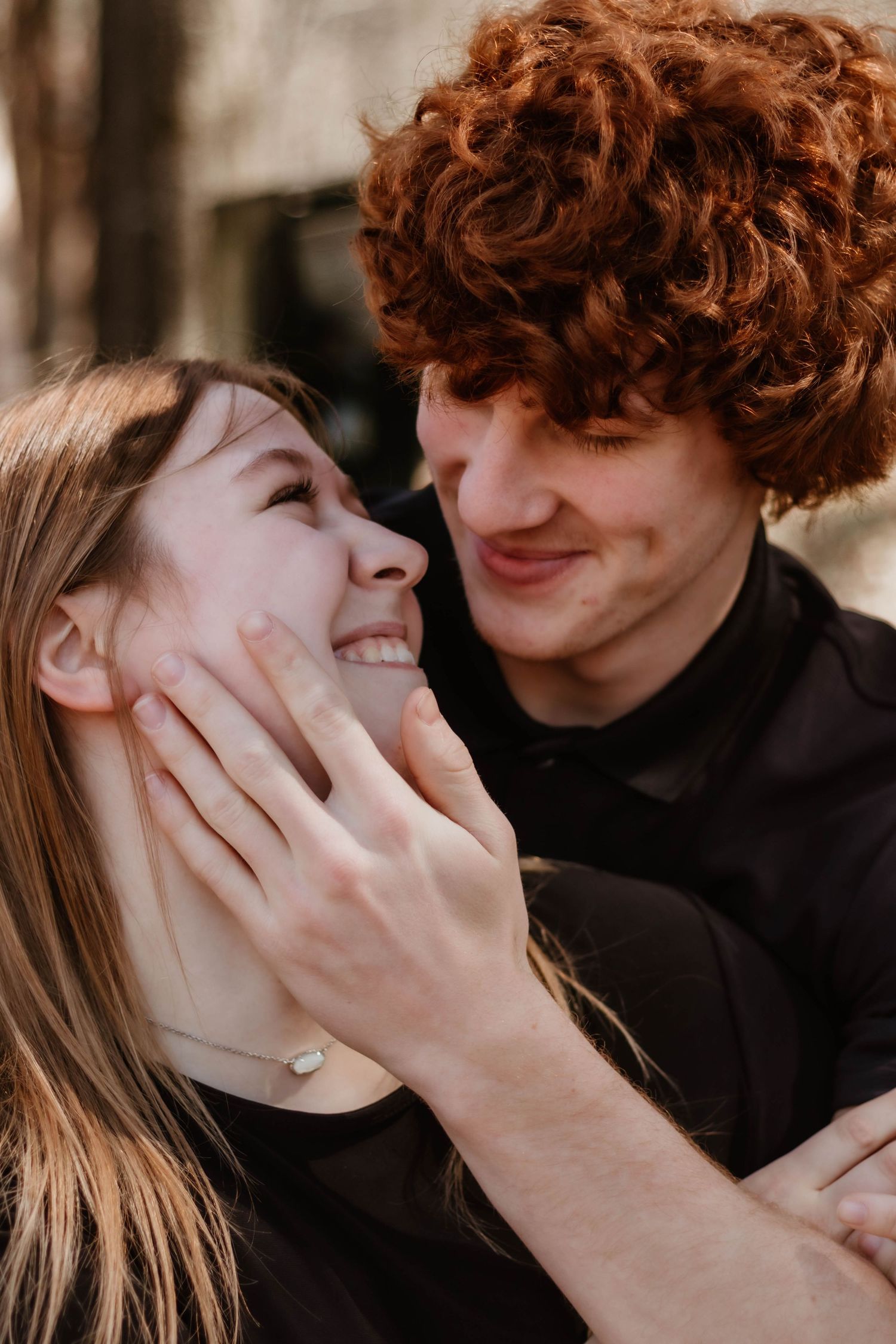 A tender romantic moment captured between a couple sharing an intimate close-up embrace at Geary Farm in Toccoa.