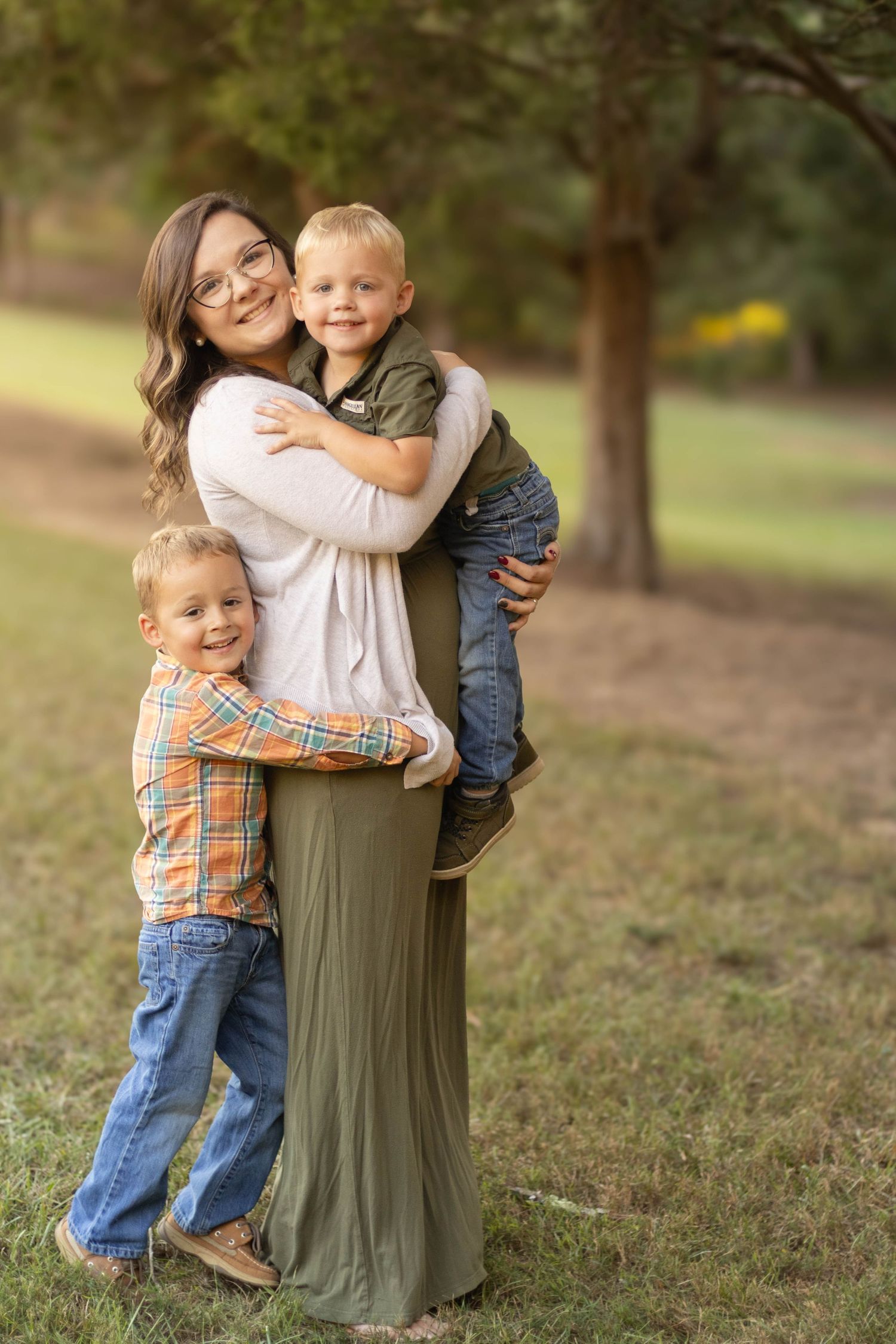 Family photos captured in a parklike setting during golden hour at Geary Farm in Northeast Georgia.