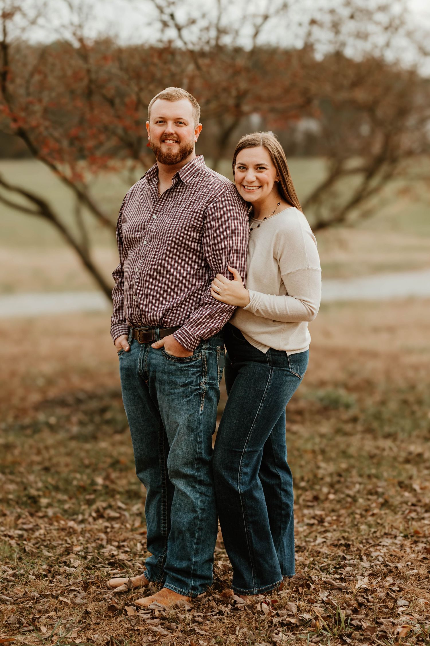 Series of candid family interactions on ground covered with fallen leaves during autumn photoshoot near Commerce, GA.